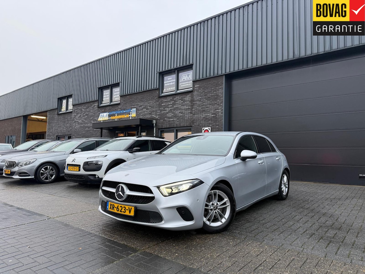 Mercedes-Benz A-klasse - 180 Business Solution | 12MND GARANTIE | NAVIGATIE | CRUISE |LED | DAB | PDC | LMV | GOED - AutoWereld.nl