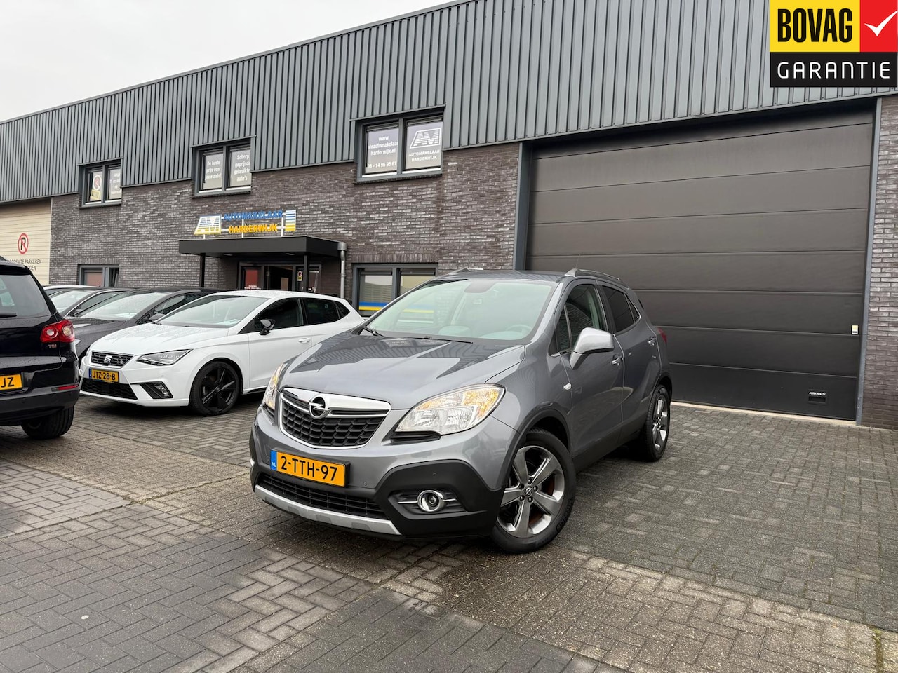 Opel Mokka - 1.4 T Cosmo | 2E EIGENAAR | 12MND GARANTIE | CRUISE | LMV | AIRCO | TREKHAAK | - AutoWereld.nl