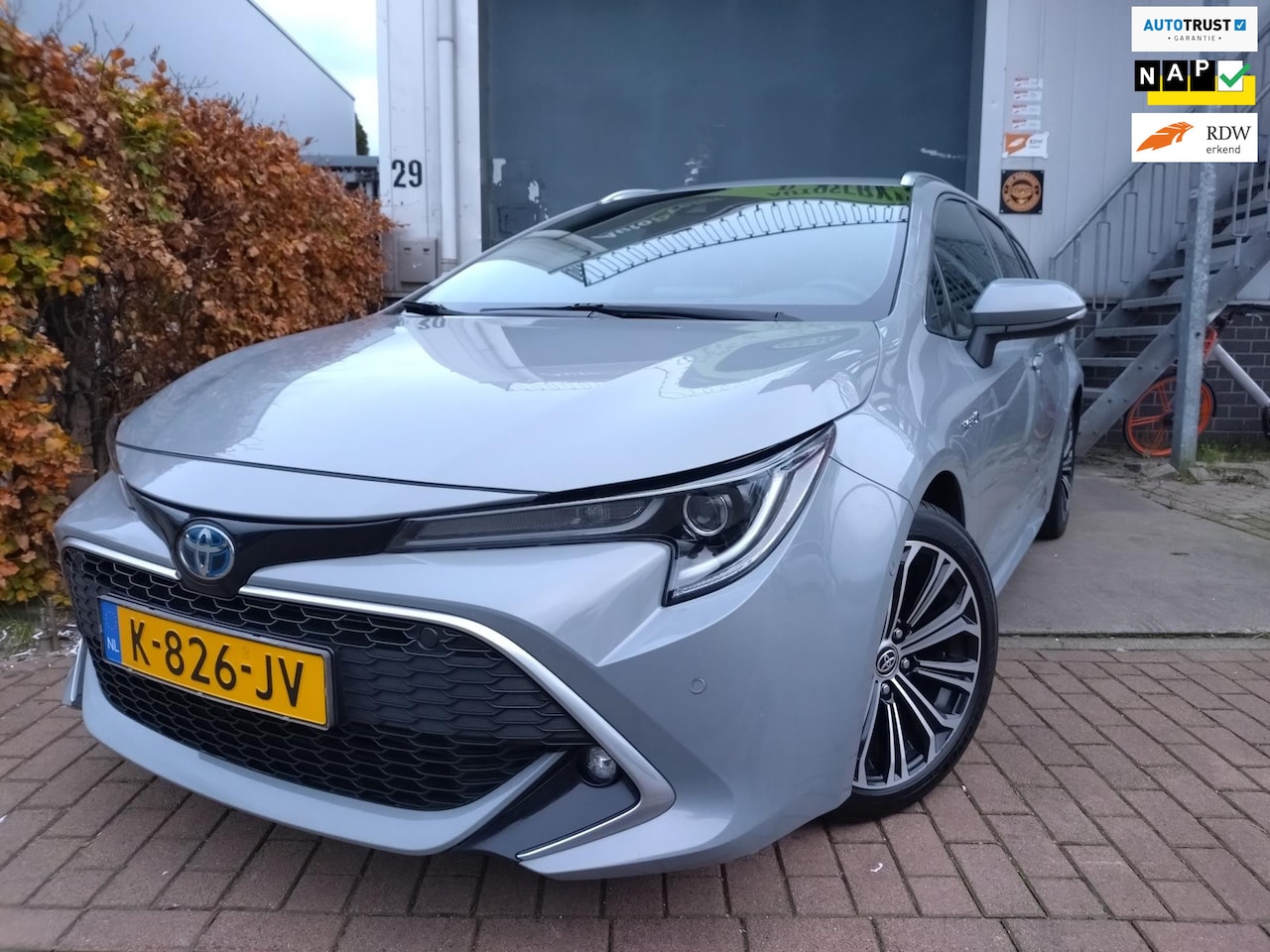 Toyota Corolla Touring Sports - 1.8 Hybrid Executive HUD - AutoWereld.nl