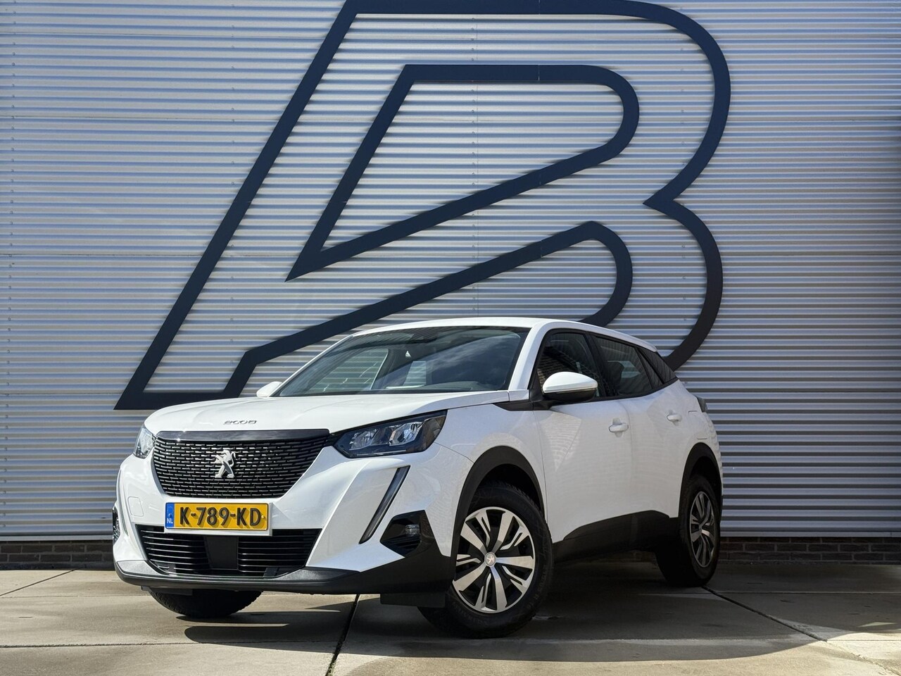 Peugeot 2008 - 1.2 PureTech Blue Lease Active 1e Eigenaar|Navi|Airco|Cruise|Carplay|PDC|Dealer onderhoude - AutoWereld.nl