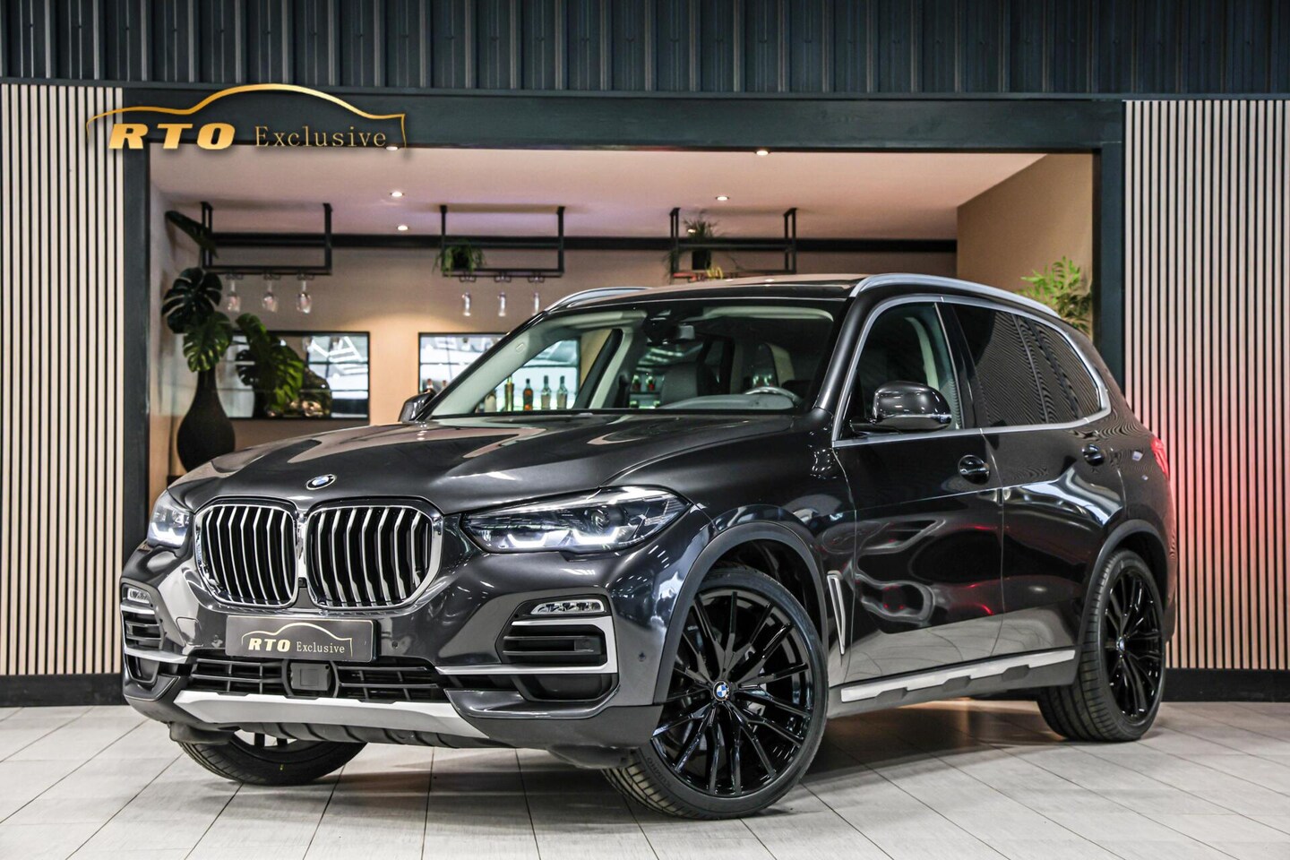 BMW X5 - xDrive40i High Executive|Achterasbesturing|ACC|Pano - AutoWereld.nl