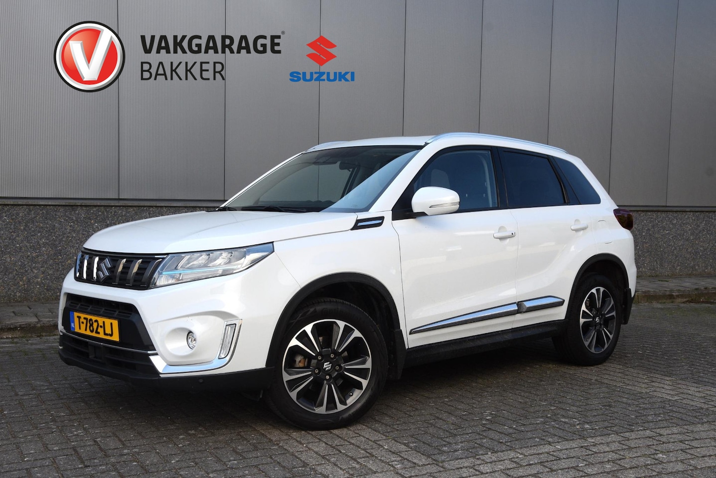 Suzuki Vitara - 1.5 Hybrid Style | Automaat | Lederen bekleding | elektrisch glazen panorama-dak | - AutoWereld.nl