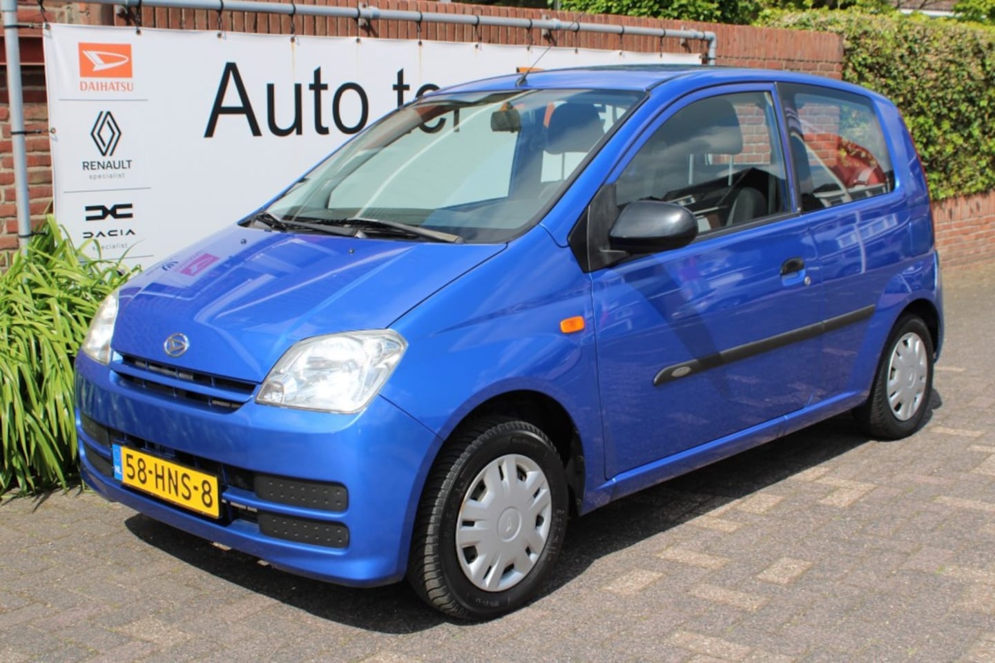 Daihatsu Cuore - 1.0 12V 100th Anniversary van 1e eigenaar - AutoWereld.nl