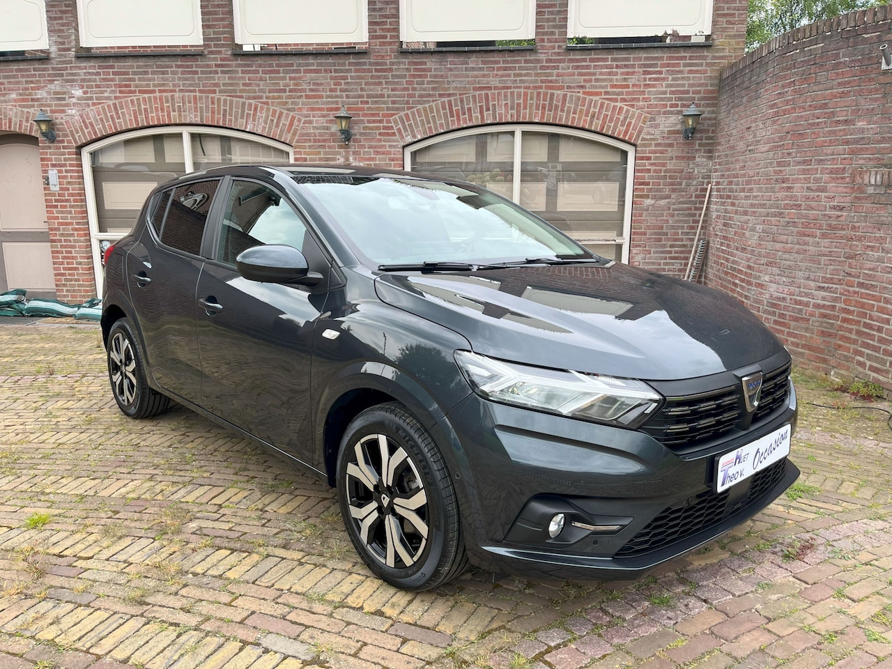 Dacia Sandero - 1.0 TCe 100 Bi-Fuel Clima/Cruise/PDC/Navi/Trekhaak - AutoWereld.nl