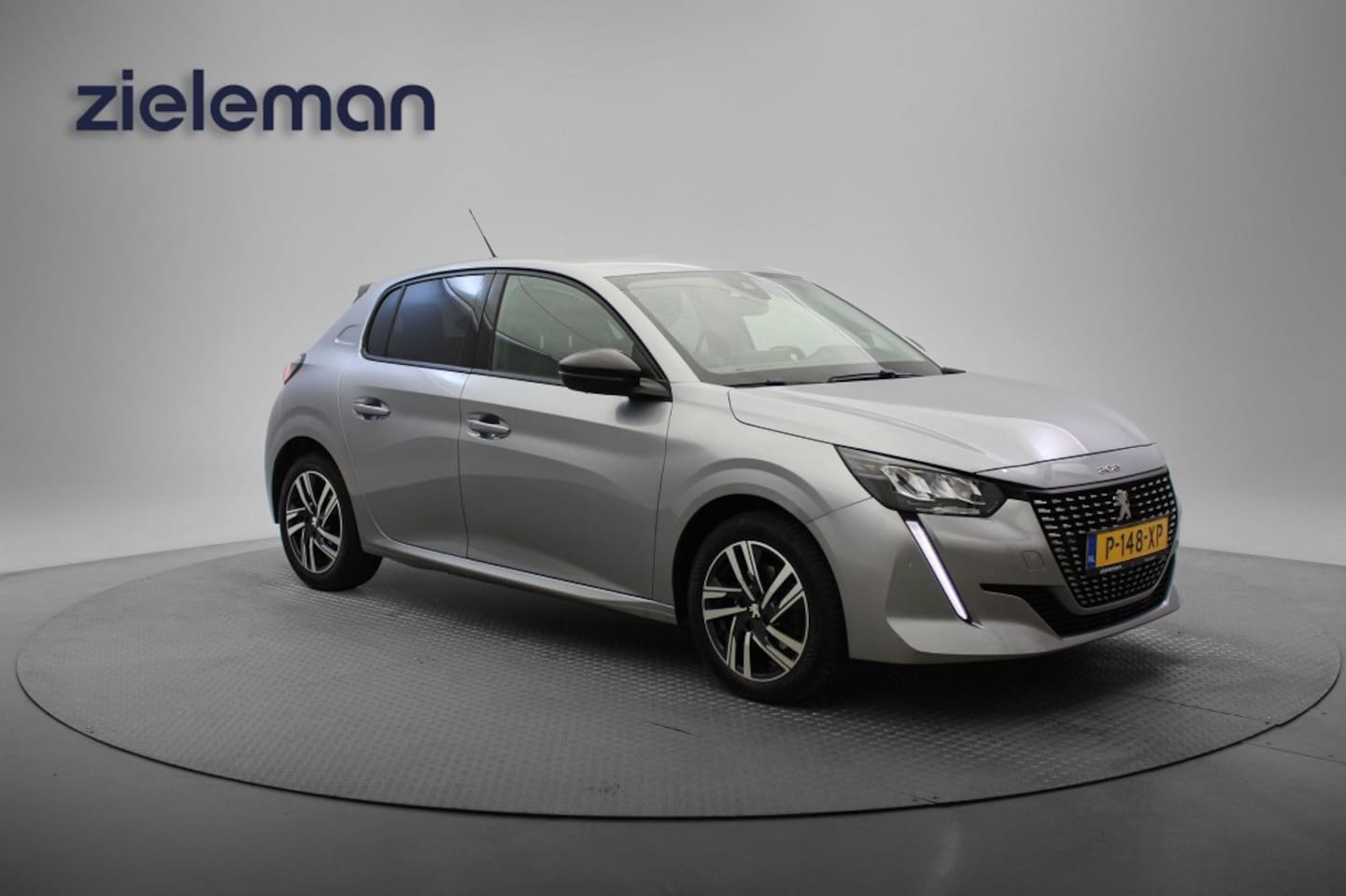 Peugeot 208 - 1.2 PureTech Allure - Carplay, Camera, Cruise, Half Leer - AutoWereld.nl