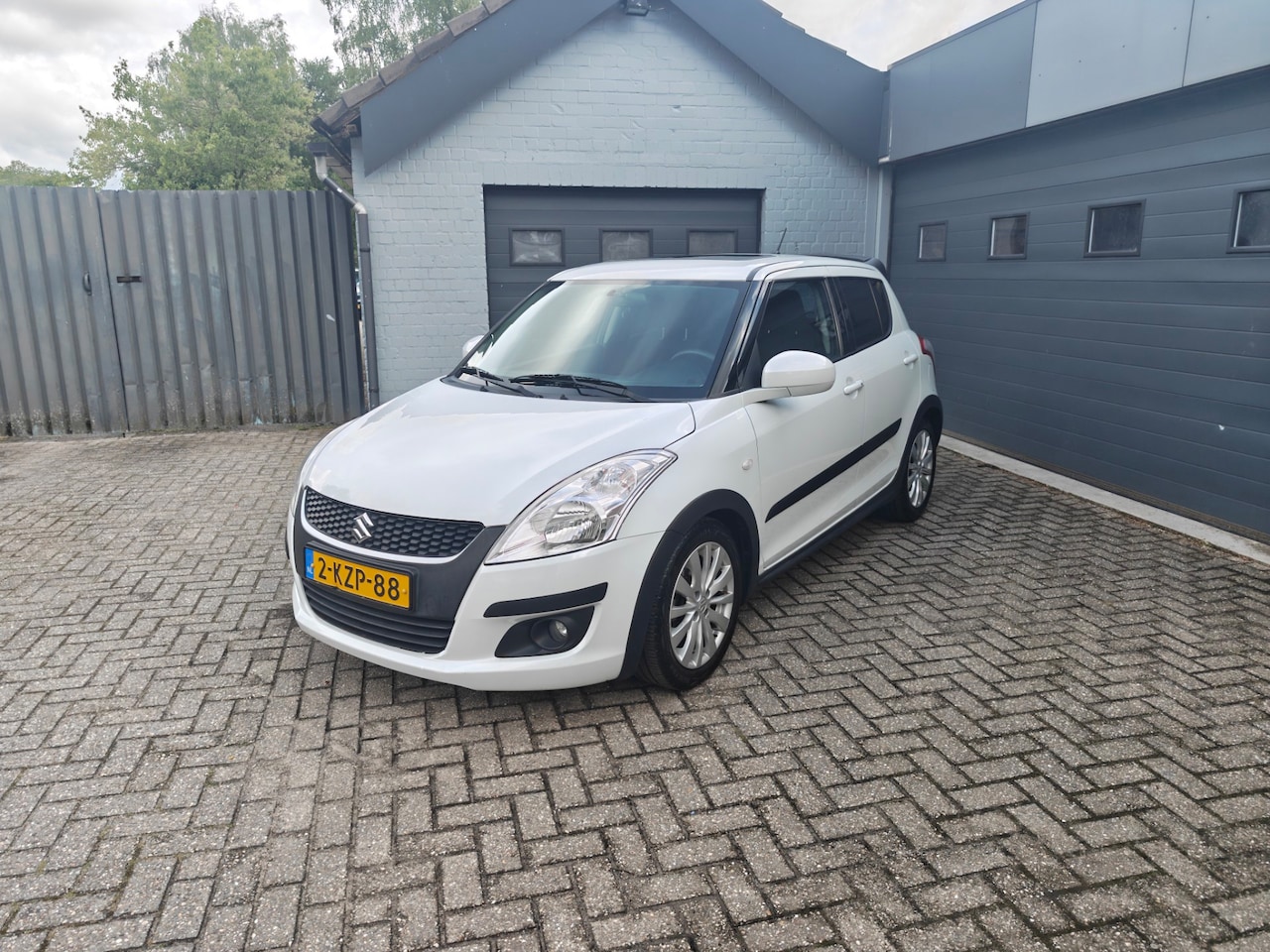 Suzuki Swift - 1.2 Exclusive 1.2 Exclusive,Panoramadak,Cruise control,Climate control,Navi,Automaat - AutoWereld.nl