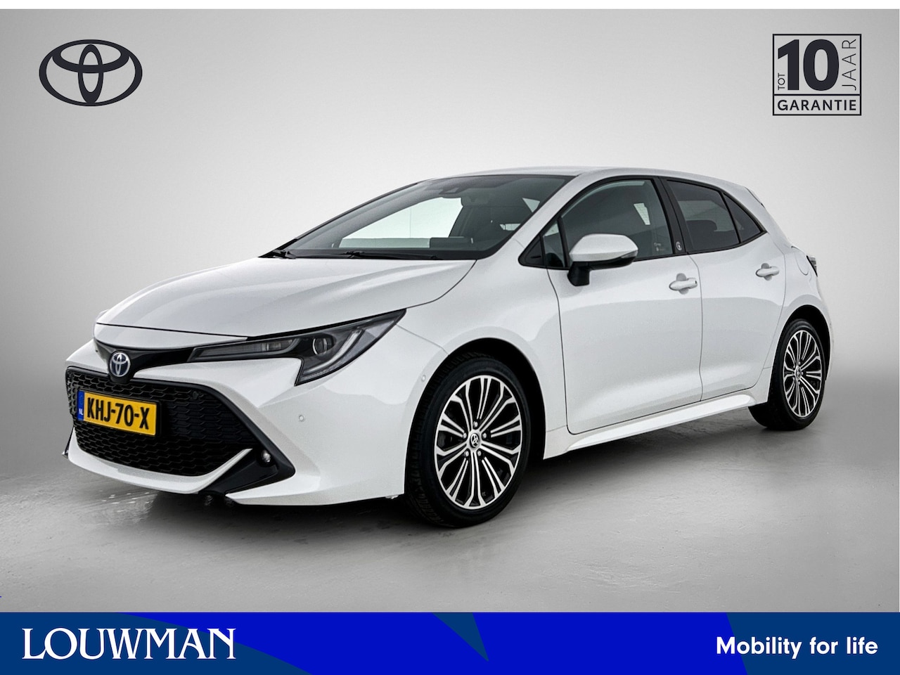 Toyota Corolla - 1.8 Hybrid Dynamic 2e set winterbanden + lichtmetalen velgen op 4e etage - AutoWereld.nl