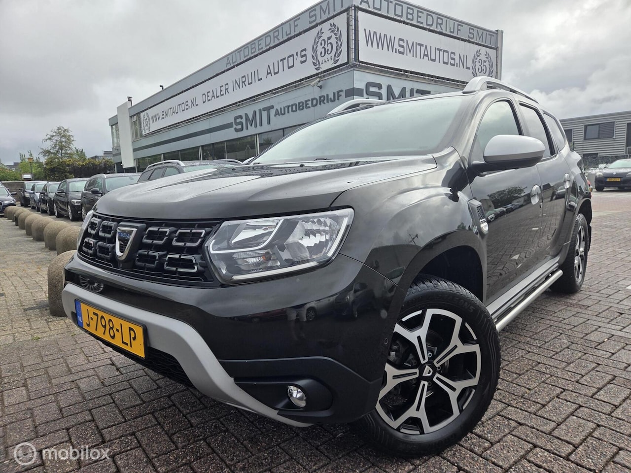 Dacia Duster - 1.3 TCe Prestige Camera/Trekhaak/Led/1eEigenaar - AutoWereld.nl