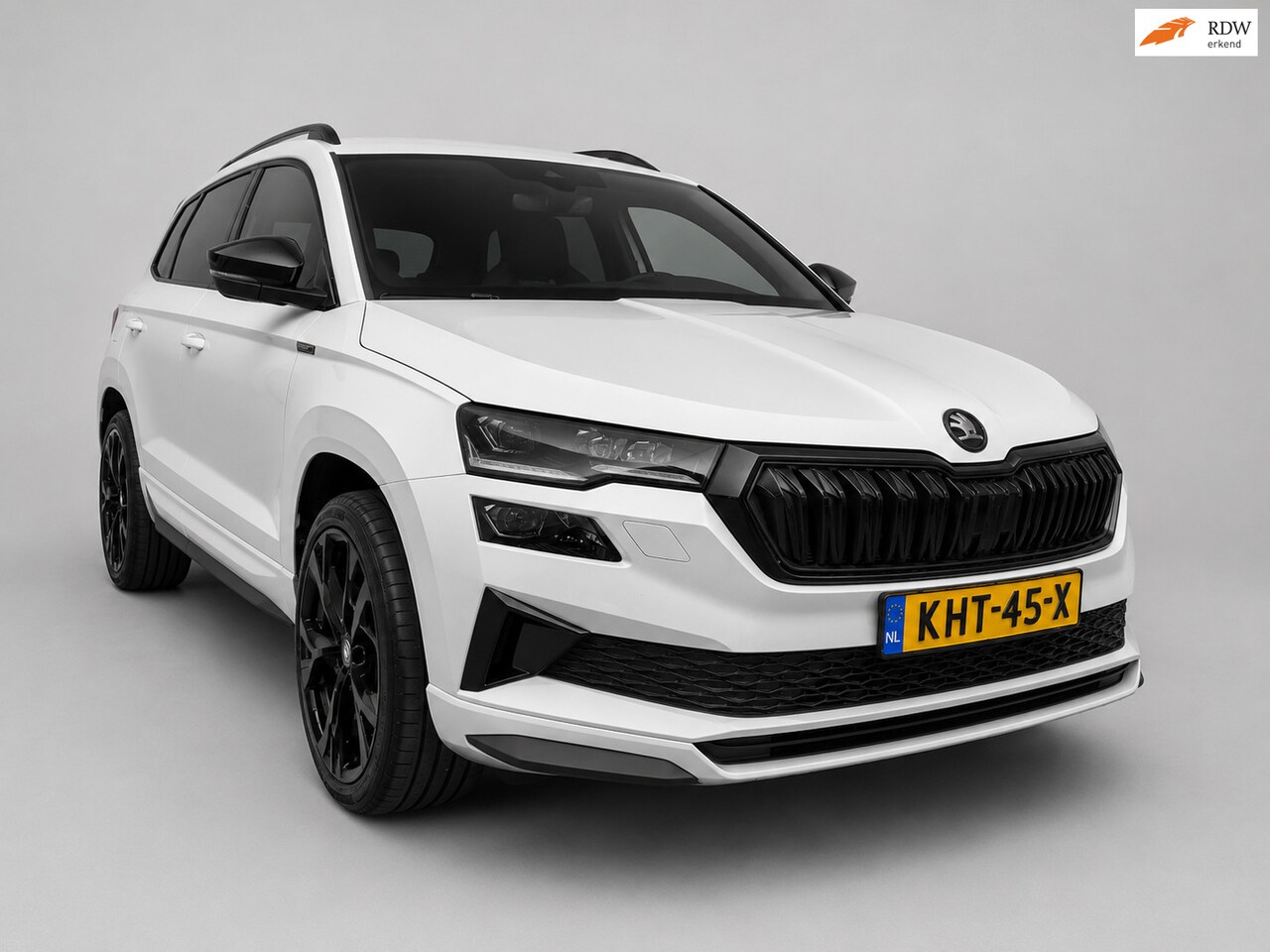 Skoda Karoq - 1.5 TSI ACT Sportline Business - Panoramadak - Stoel en Stuurverw - Adapt Cruise - CarPlay - AutoWereld.nl