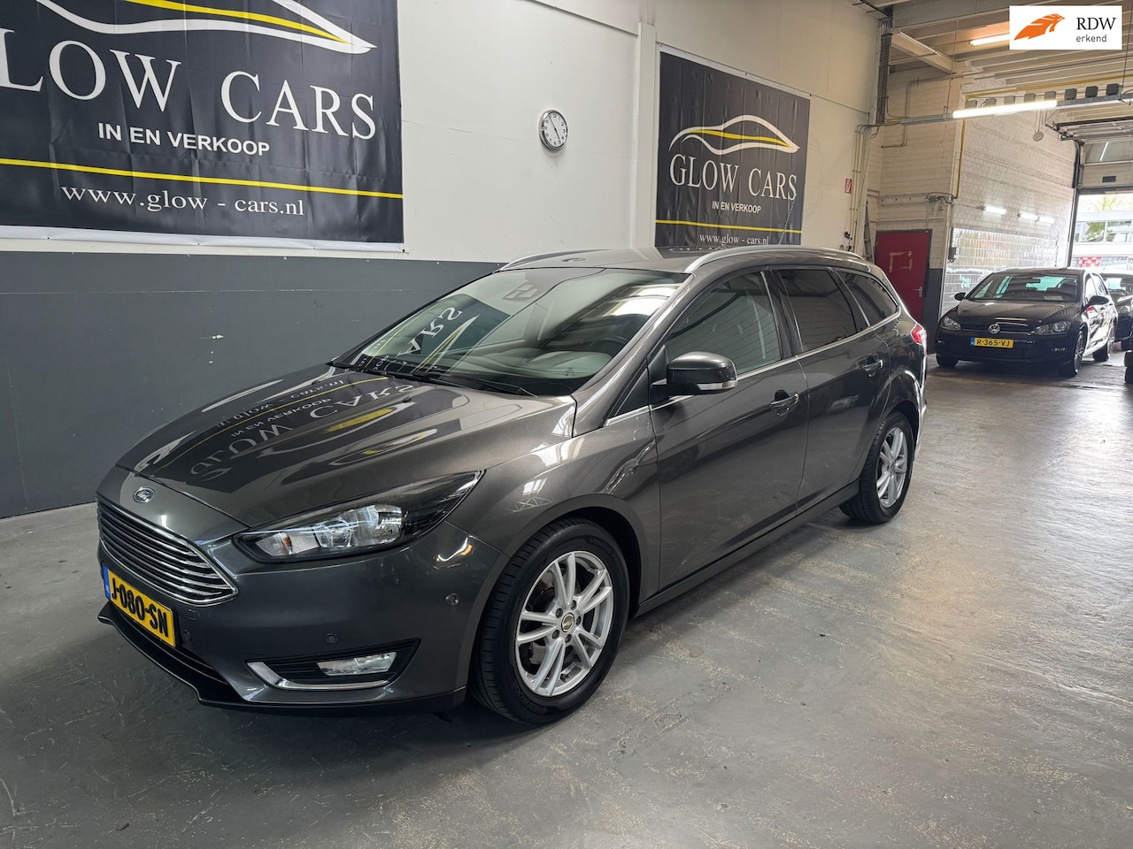 Ford Focus Wagon - 1.5 Titanium Edition |CRUISE|PDC|NAVI|STOEL.VERVARM| - AutoWereld.nl