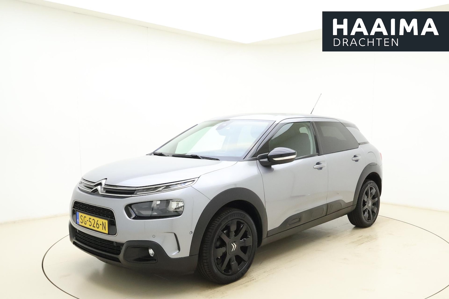 Citroën C4 Cactus - 1.2T Shine 110pk | Panorama dak | 17'' LM Velgen | Camera | Navigatie | Climate Control | - AutoWereld.nl