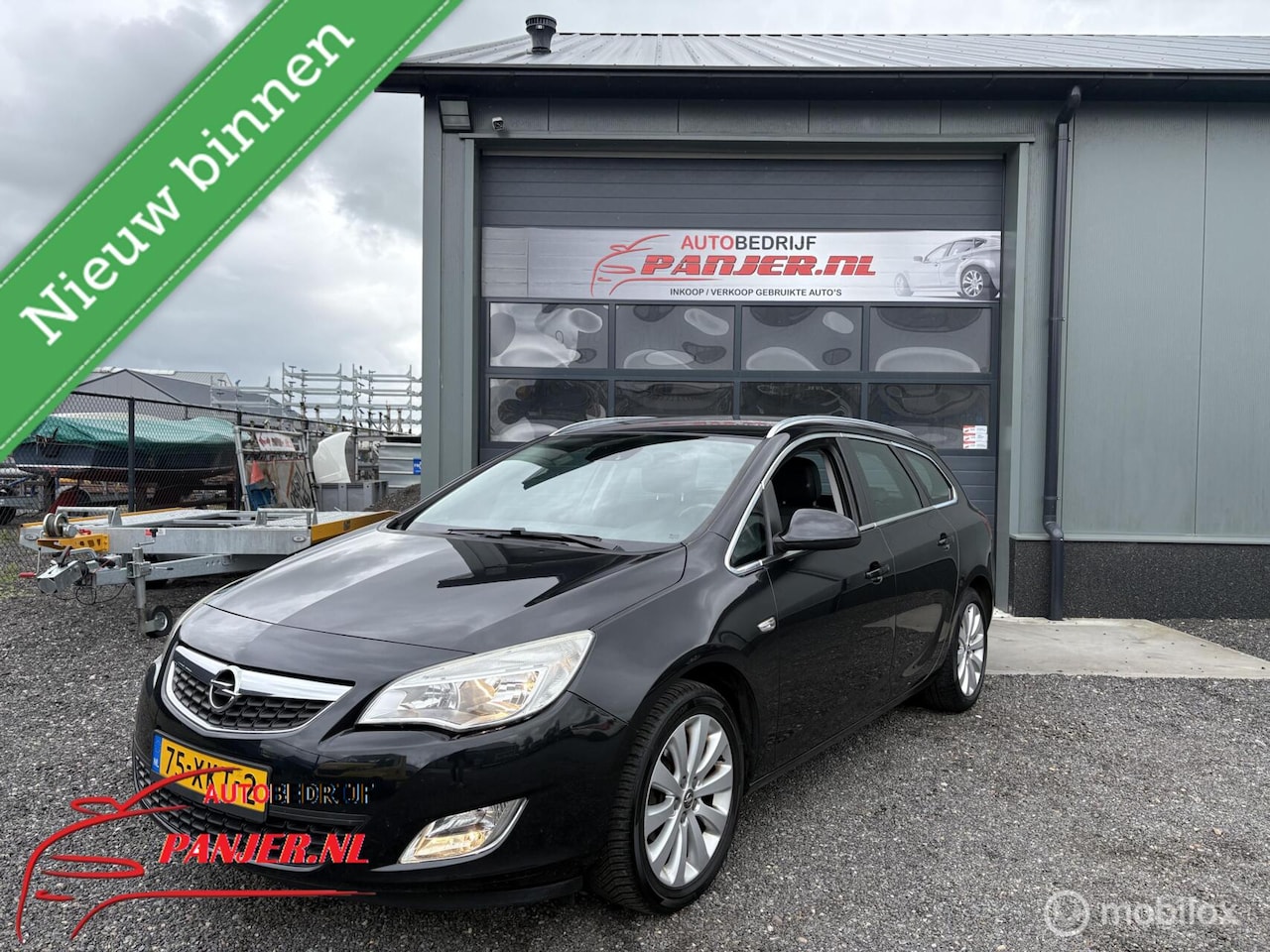 Opel Astra Sports Tourer - 1.4 Turbo "COMPLETE AUTO" - AutoWereld.nl