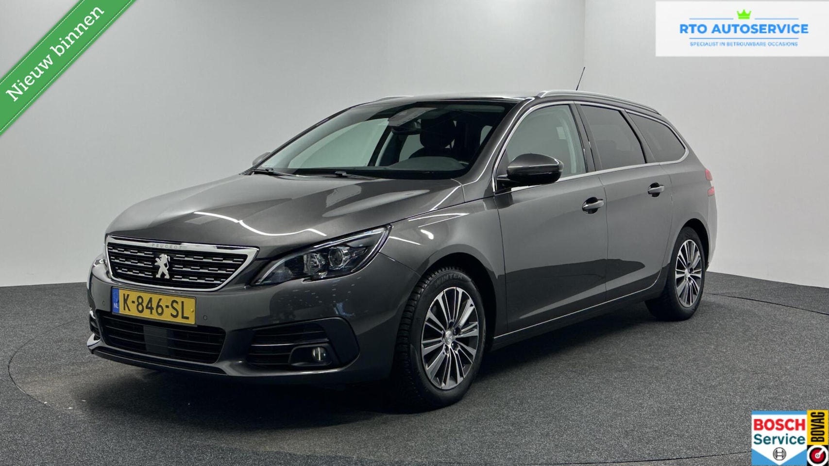Peugeot 308 SW - 1.2 PureTech Blue Lease Allure TREKHAAK CAMERA NAVI CRUISE LM. - AutoWereld.nl
