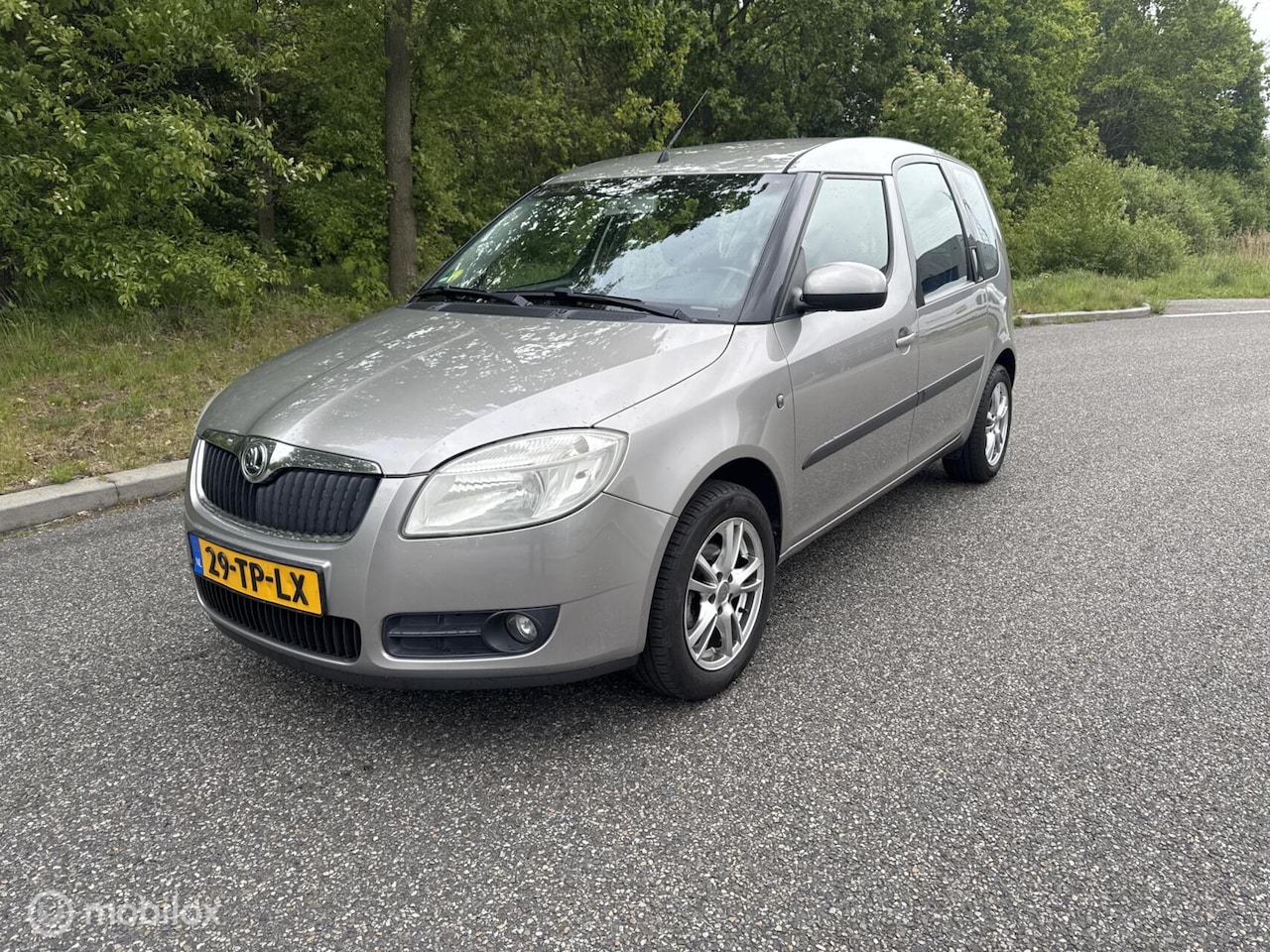 Skoda Roomster - 1.4-16V Comfort climate en cruise control - AutoWereld.nl
