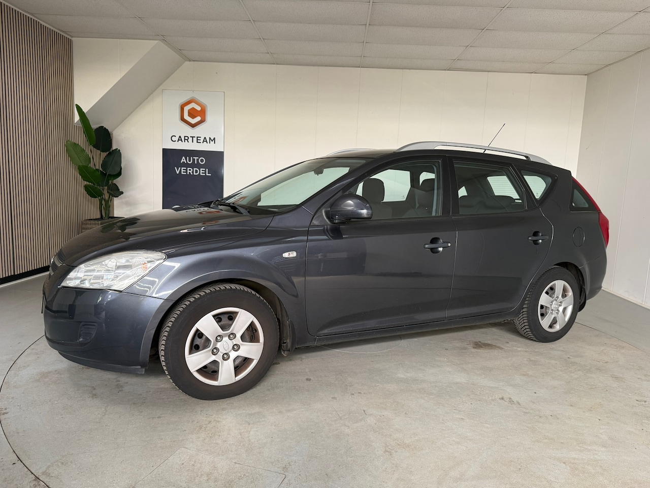 Kia Cee'd Sporty Wagon - 1.4 X-tra Airco, Trekhaak - AutoWereld.nl