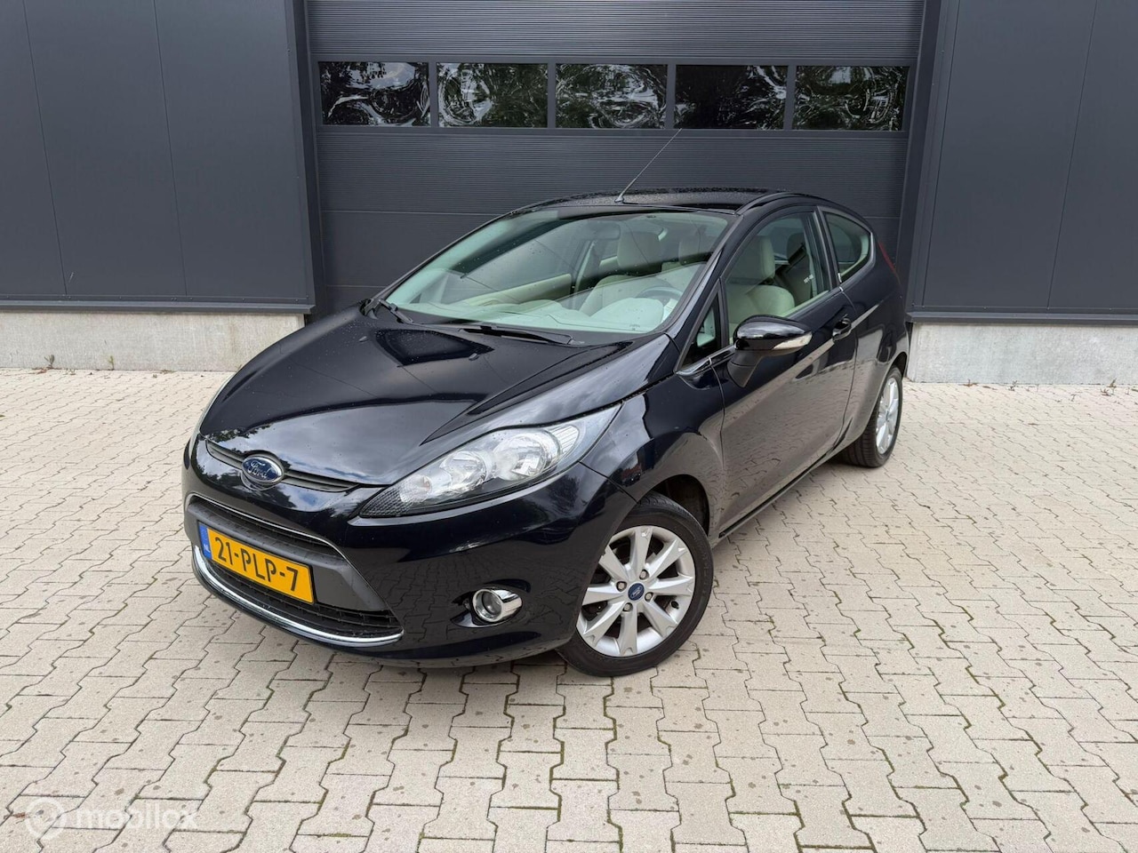 Ford Fiesta - 1.25 Ghia Airco I Distributie Verv I NAP - AutoWereld.nl