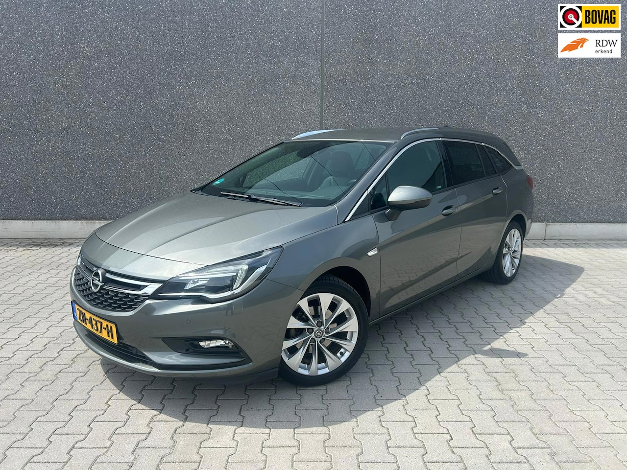 Opel Astra Sports Tourer - 1.4 Innovation | TREKHAAK | BLUETOOTH | LEDER | STOEL/STUURVERWARMING | CC | PDC | APK T/M - AutoWereld.nl