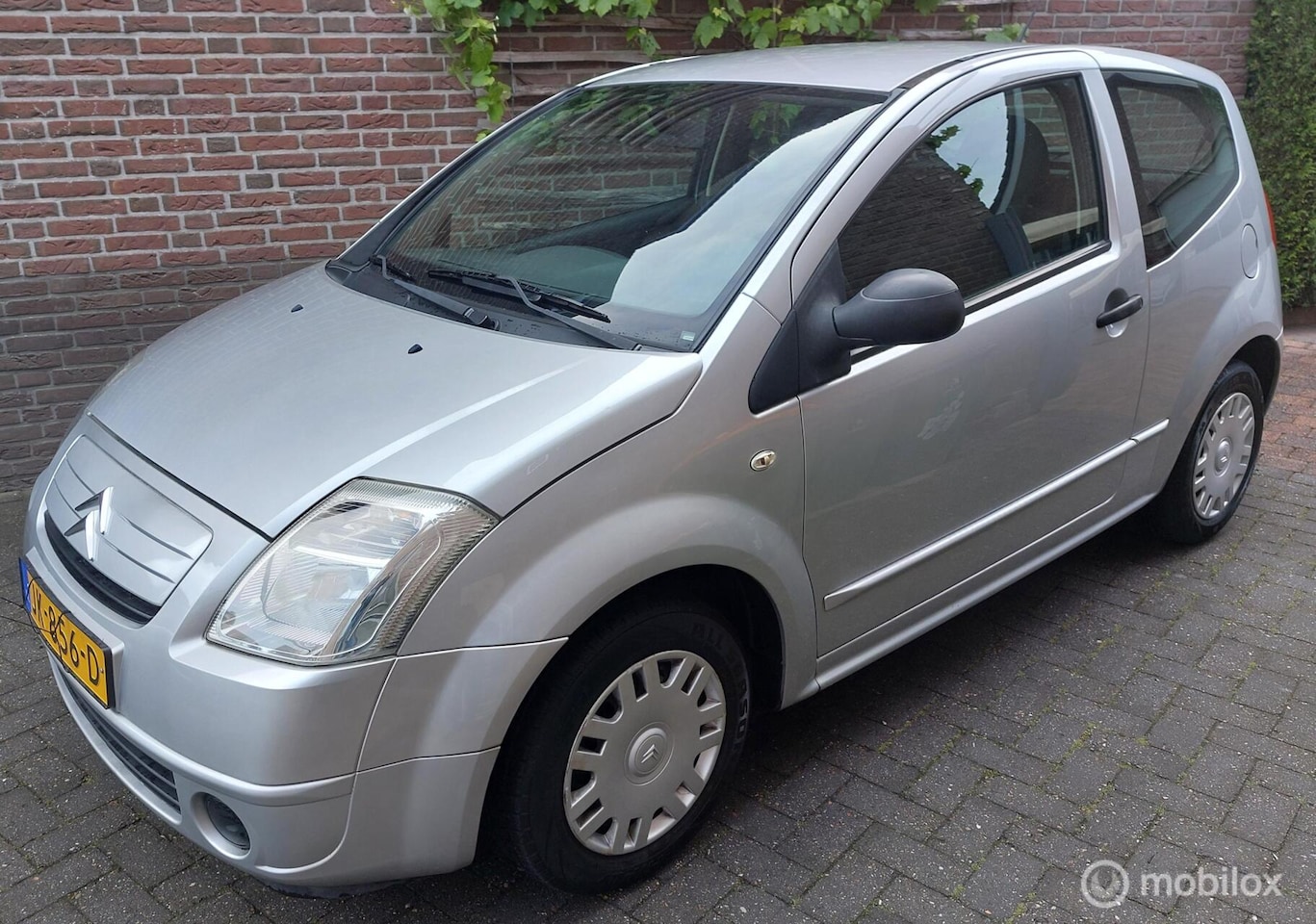 Citroën C2 - 1.1i Séduction ZEER MOOI/LAGE KMS/NW.DISTRIBUTIE - AutoWereld.nl
