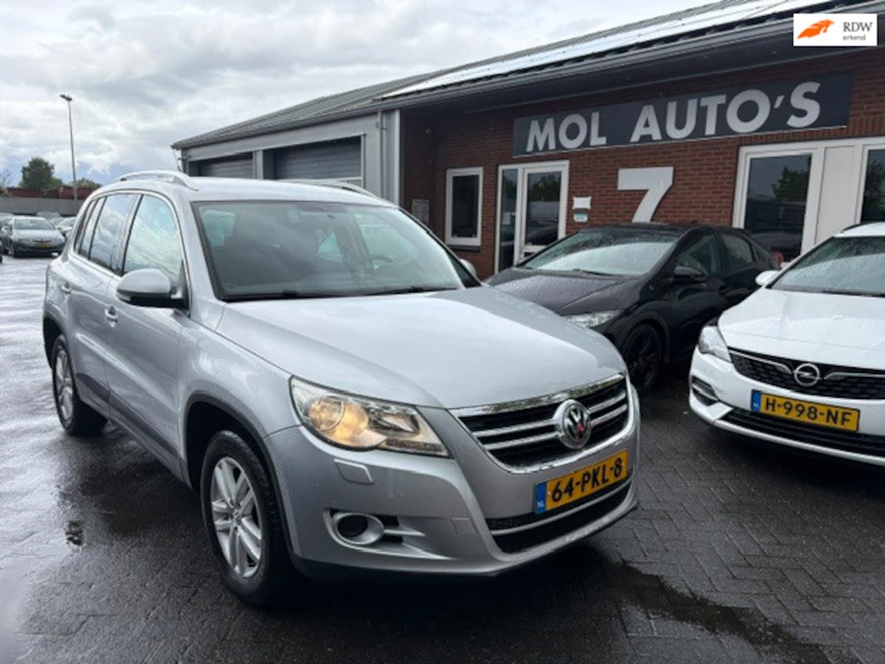Volkswagen Tiguan - 2.0 TSI Sport&Style 4Motion APK 03-27 - AutoWereld.nl