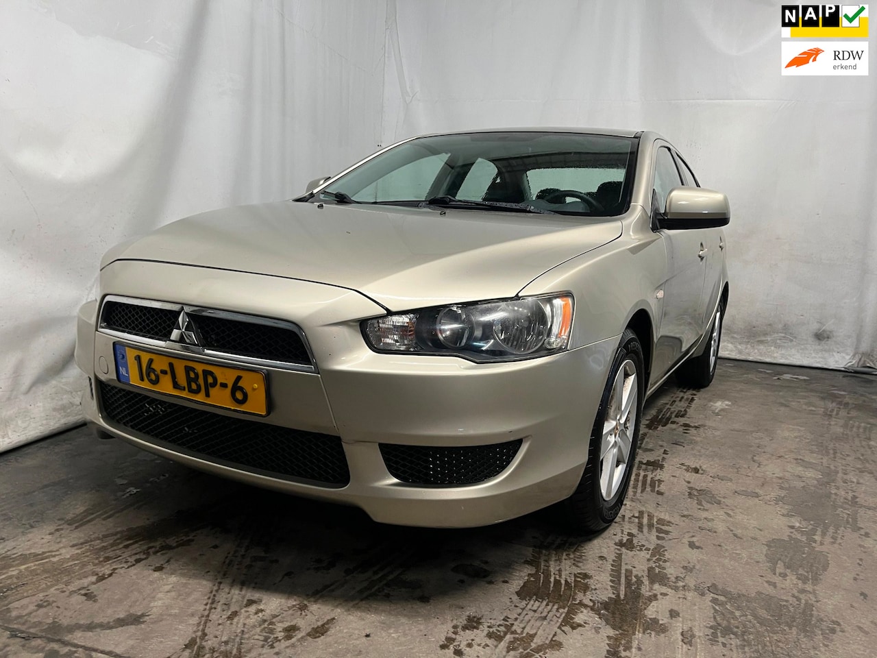 Mitsubishi Lancer Sports Sedan - 1.5 Invite - Schade - AutoWereld.nl