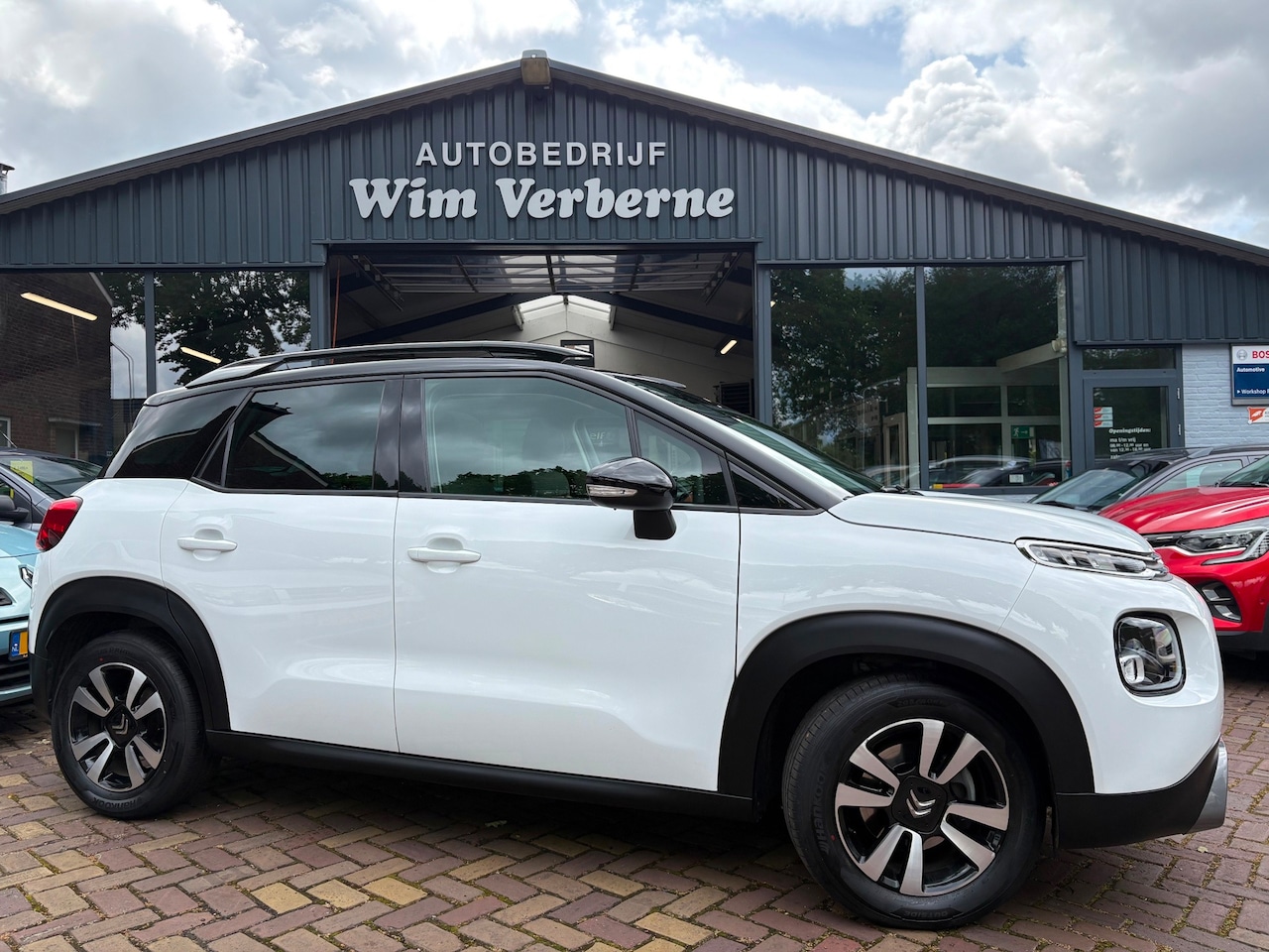 Citroën C3 Aircross - 1.2 PureTech S&S Shine Schuifdak ! - AutoWereld.nl
