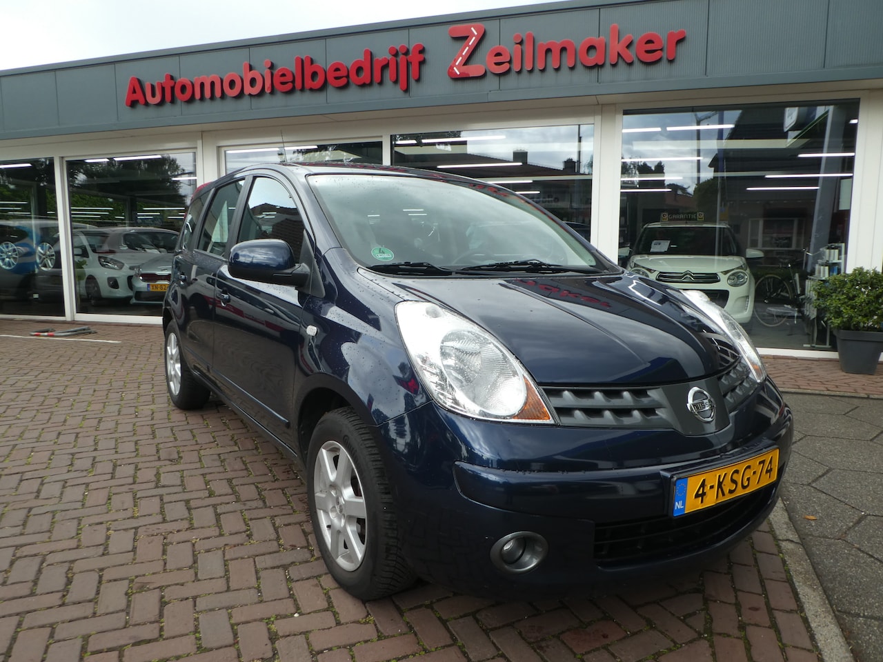 Nissan Note - 1.4 Life Airco, Trekhaak, Lm velgen met Allseason banden - AutoWereld.nl