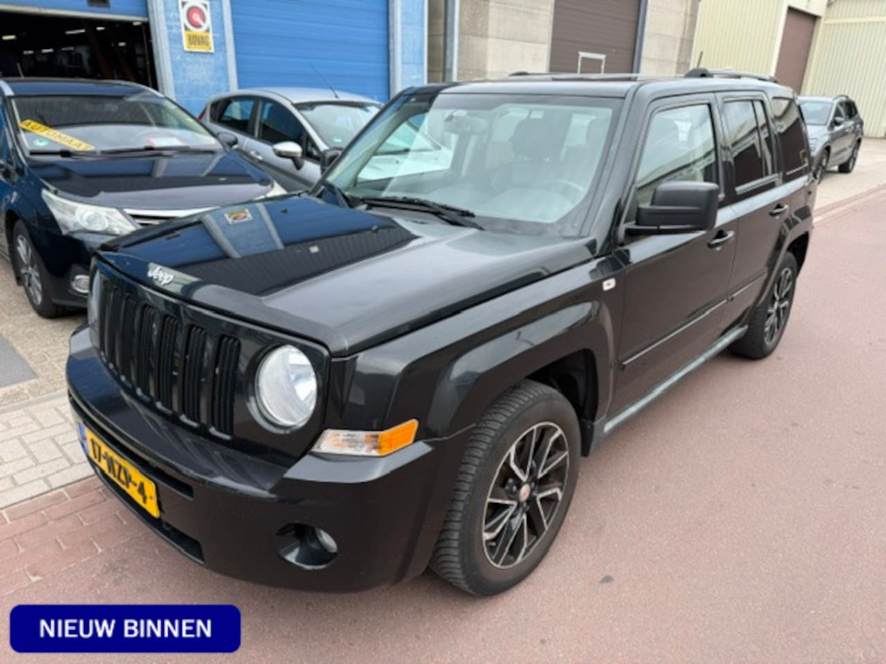 Jeep Patriot - 2.4 Limited Liberty 2011 NAP 128.374km LEER Origineel in Nederland geleverde auto met boek - AutoWereld.nl