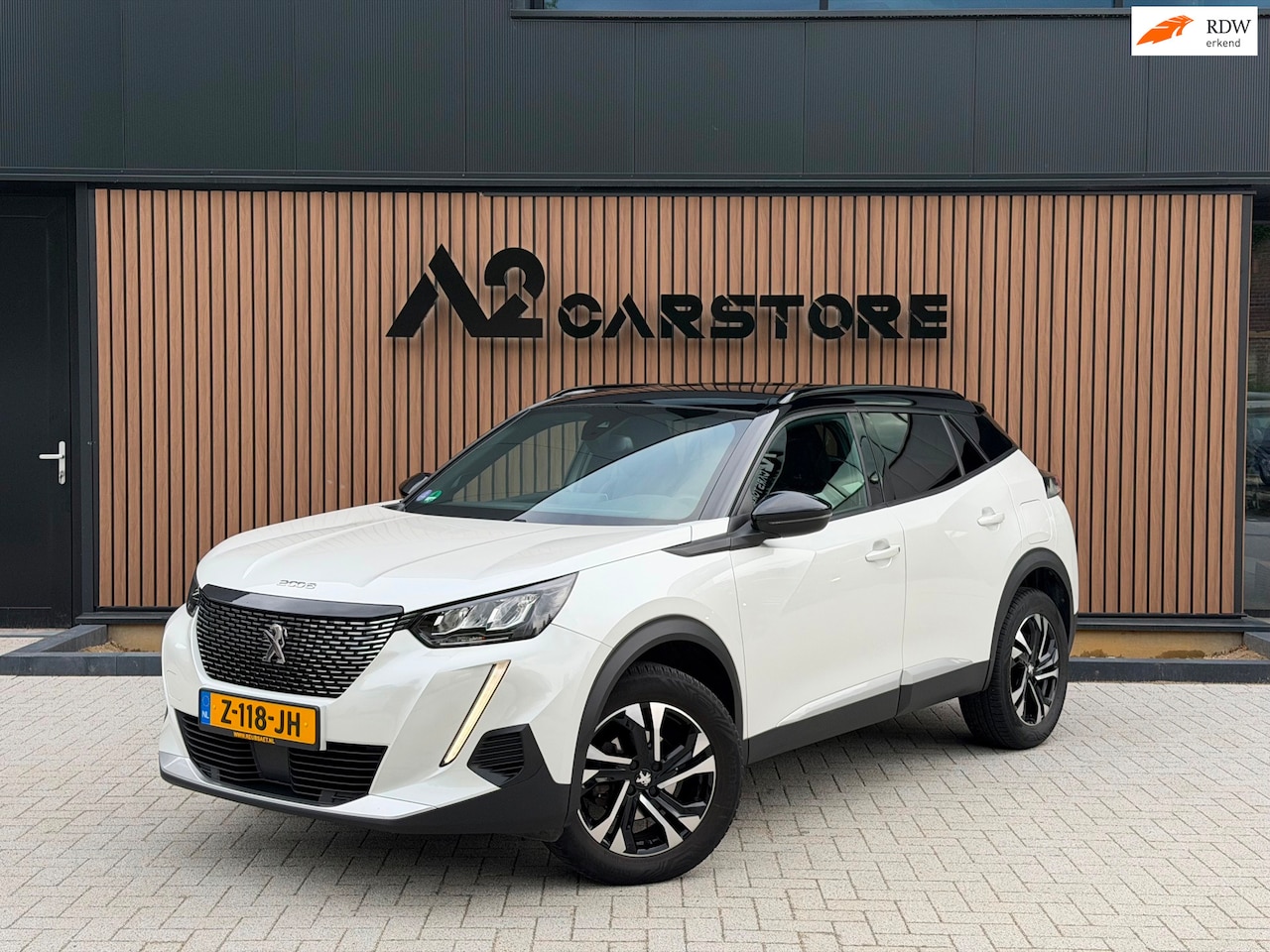 Peugeot 2008 - 1.2 PureTech Allure Pack AUTOMAAT TREKHAAK CAMERA - AutoWereld.nl