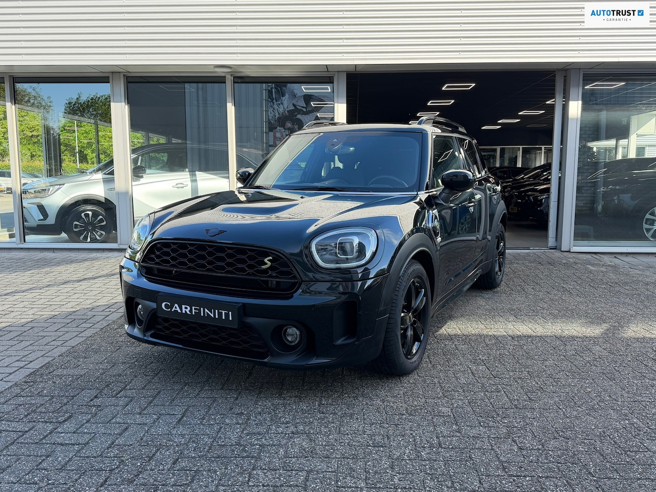 MINI Countryman - 1.5 Cooper S E ALL4 Black Edition 220 Pk | Navigatie | Cruise | Camera | Clima | Voll Lede - AutoWereld.nl