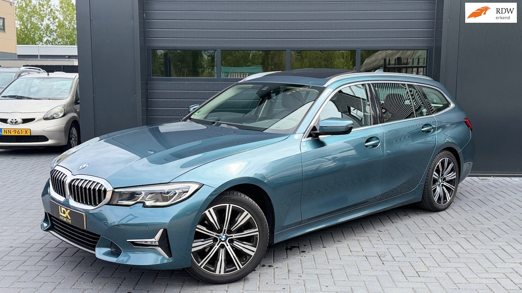 BMW 3-serie Touring - 320i High Executive|trekhaak|Pano| - AutoWereld.nl