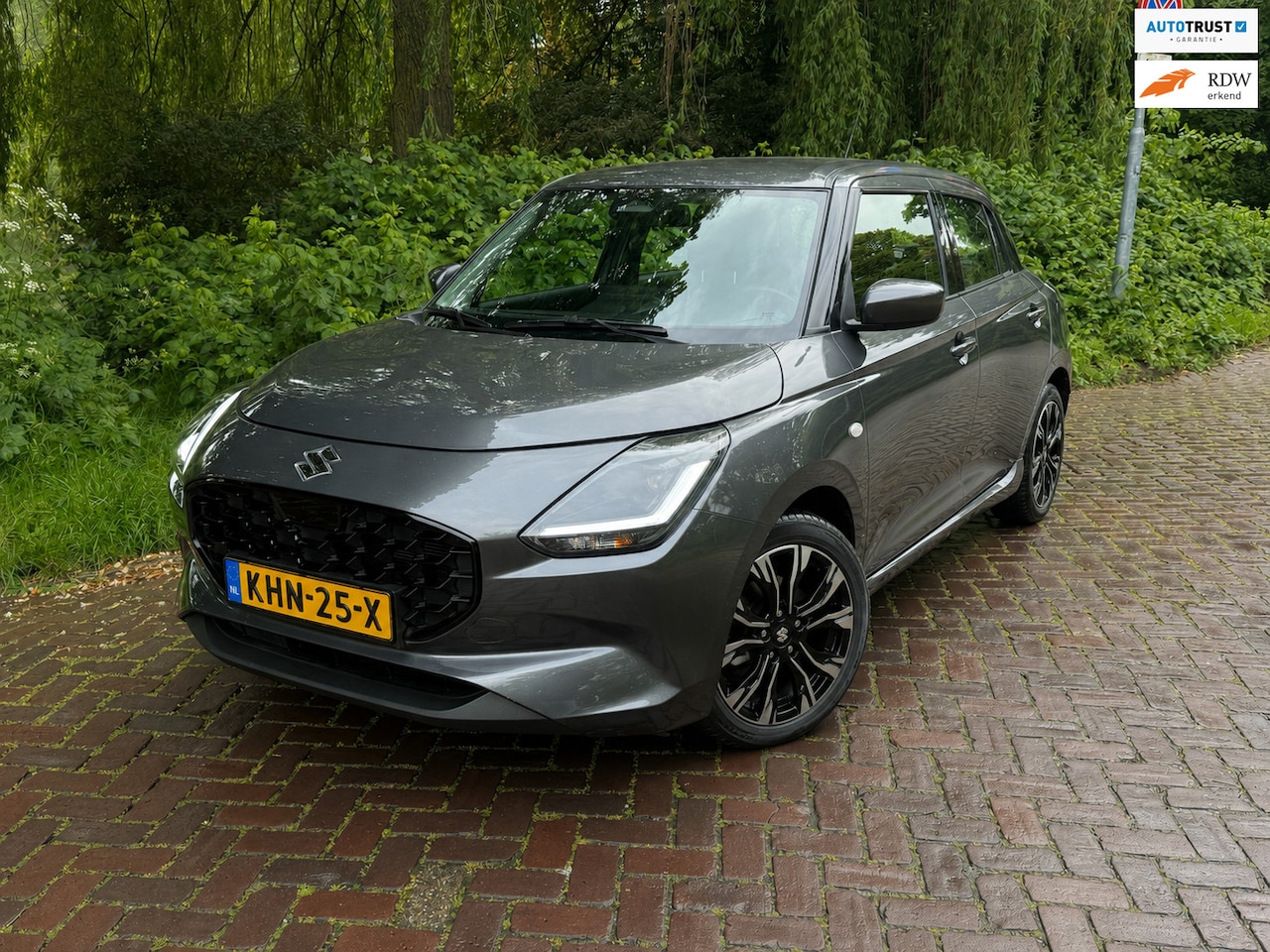 Suzuki Swift - 1.2 Comfort Smart Hybrid 1 Eig.b.j. 10-2024 17000 km 15” lm velgen - AutoWereld.nl