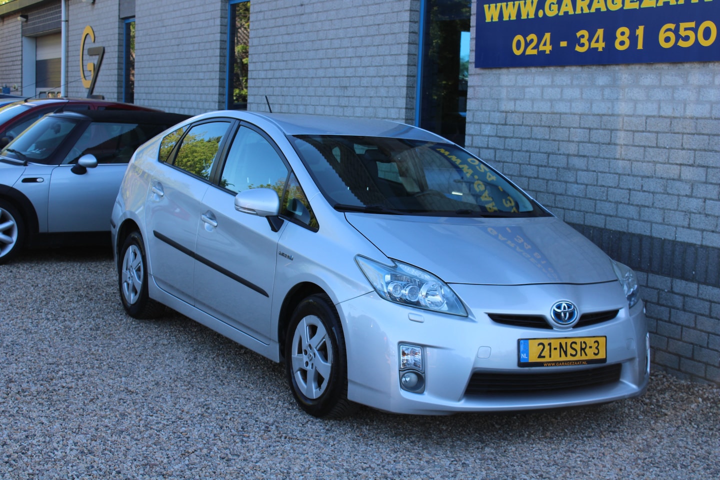 Toyota Prius - 1.8 Aspiration Clima Xenon - AutoWereld.nl