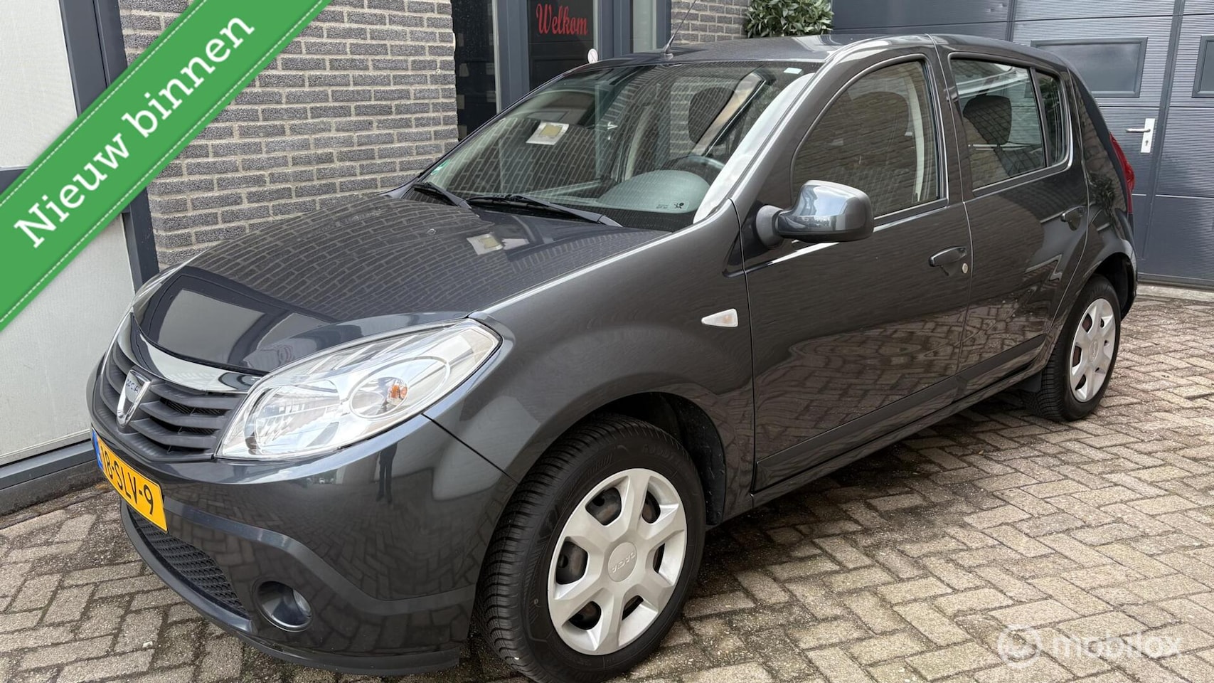 Dacia Sandero - 1.2 Lauréate LPG * 61000 KM * - AutoWereld.nl
