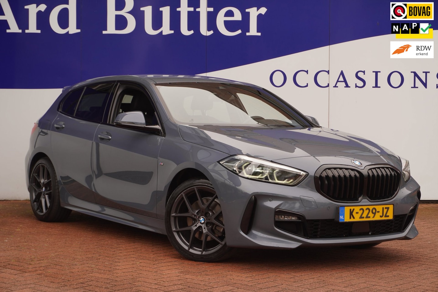 BMW 1-serie - 118i Executive M-Sport / Stoel-verw. / HiFi-Audio / Premium-Storm-Bay / Dak-Spoiler / Body - AutoWereld.nl