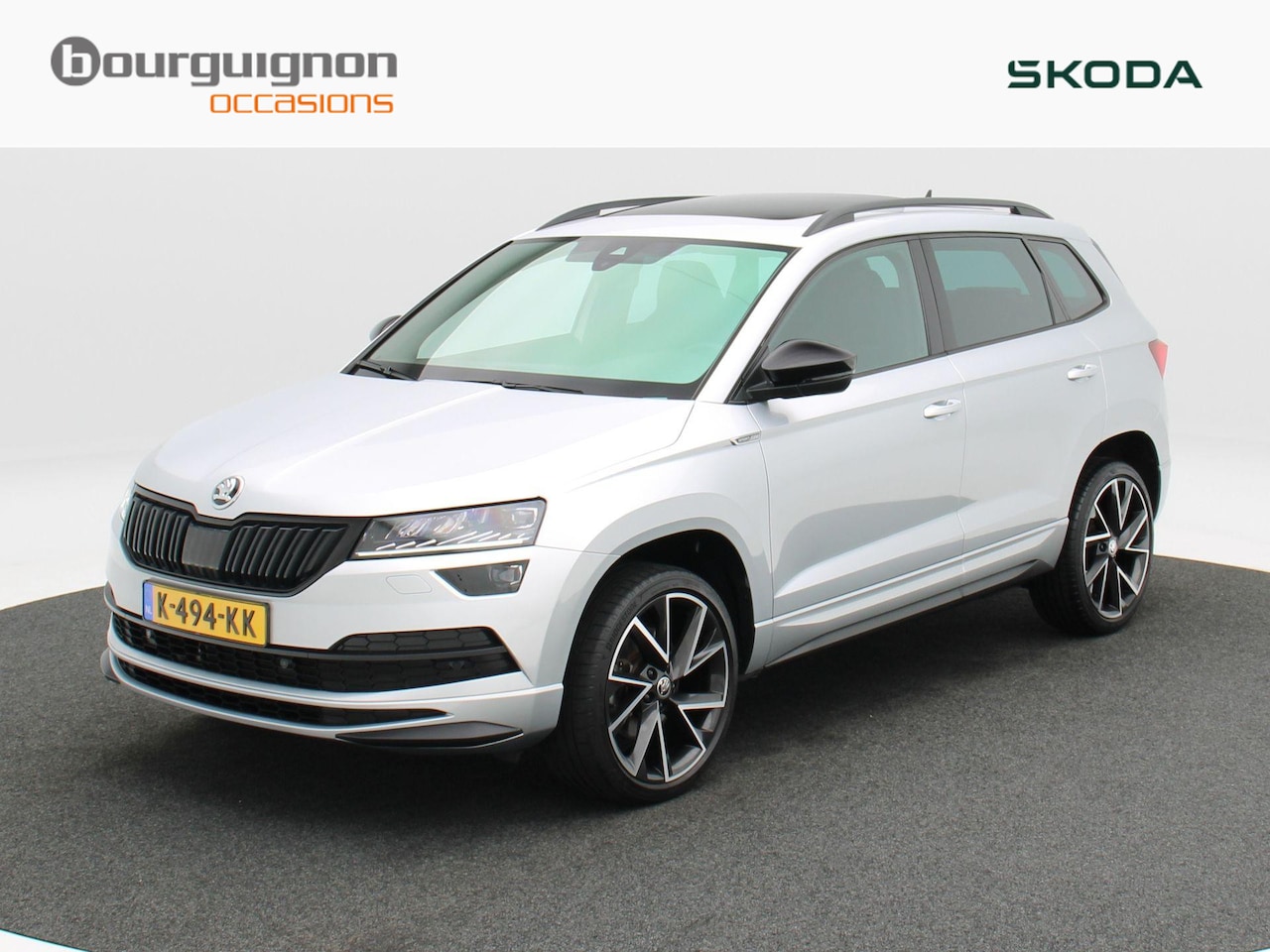 Skoda Karoq - 1.5 TSi 150 Pk Automaat Sportline Business | Panorama dak | Stoelverwarming | Trekhaak | C - AutoWereld.nl