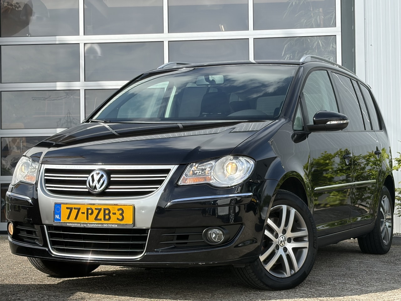 Volkswagen Touran - 1.4 TSI Comfortline 140pk | Audio-navigatie full map + hard disk | Bluetooth | Cruise cont - AutoWereld.nl
