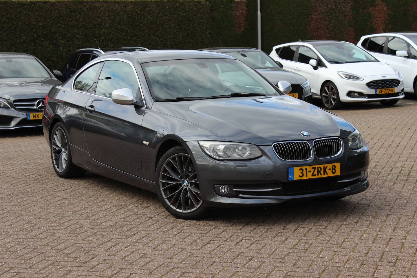 BMW 3-serie Coupé - 320i Corporate Lease Mineralgrey Ed. / Leder / Navigatie / 18'' / Parkeerhulp achter / Spo - AutoWereld.nl