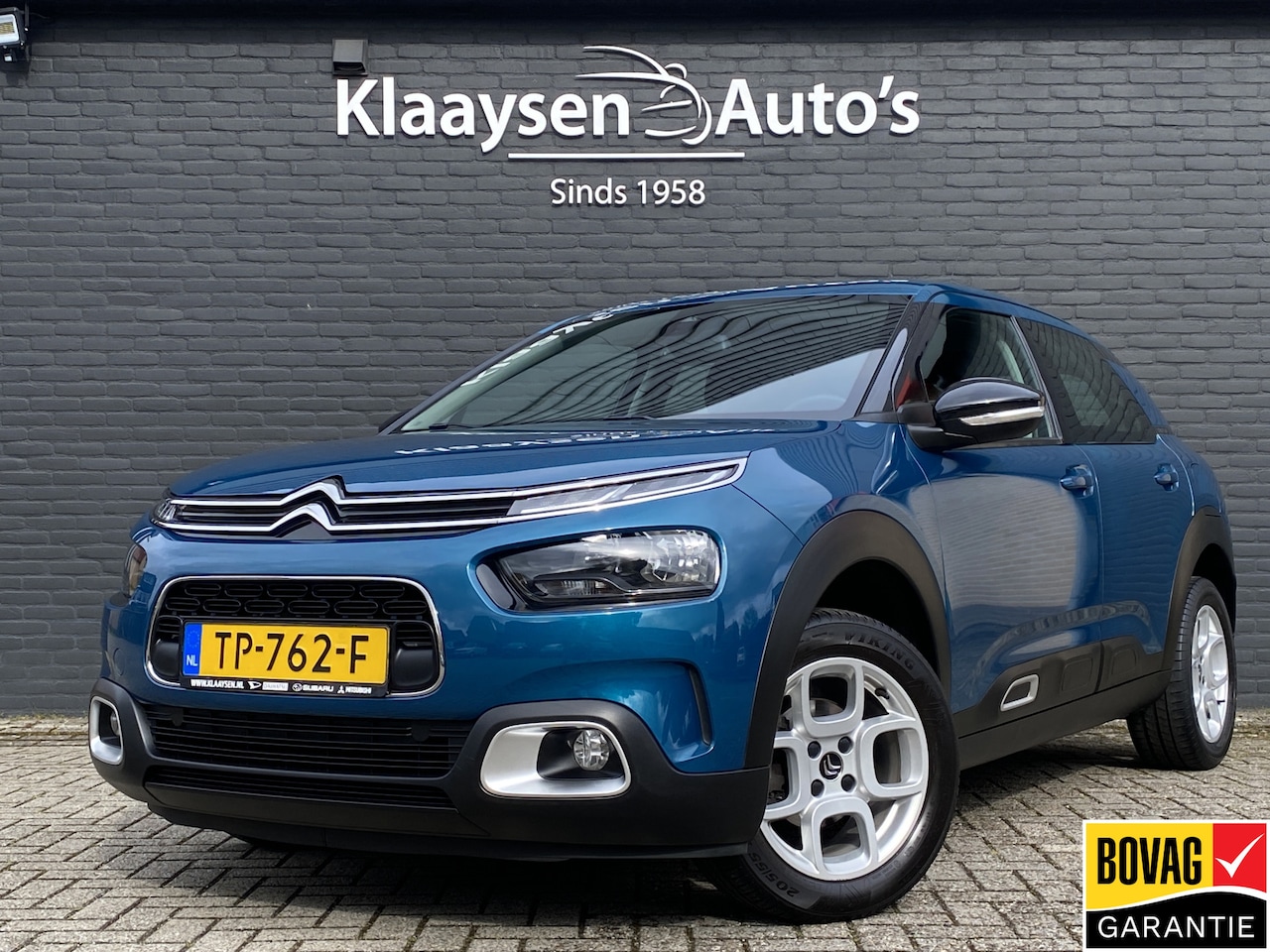 Citroën C4 Cactus - 1.2 PureTech Business | navigatie | trekhaak | cruise control | parkeersensoren | apple ca - AutoWereld.nl