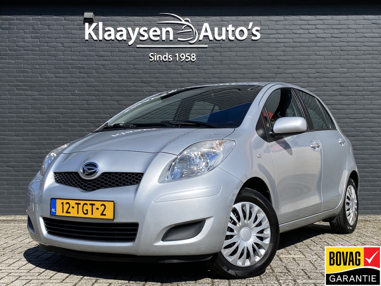 Daihatsu Charade - 1.3 City AUT. | dealer onderhouden | airco | trekhaak | parkeersensoren | schuifbank | ele - AutoWereld.nl