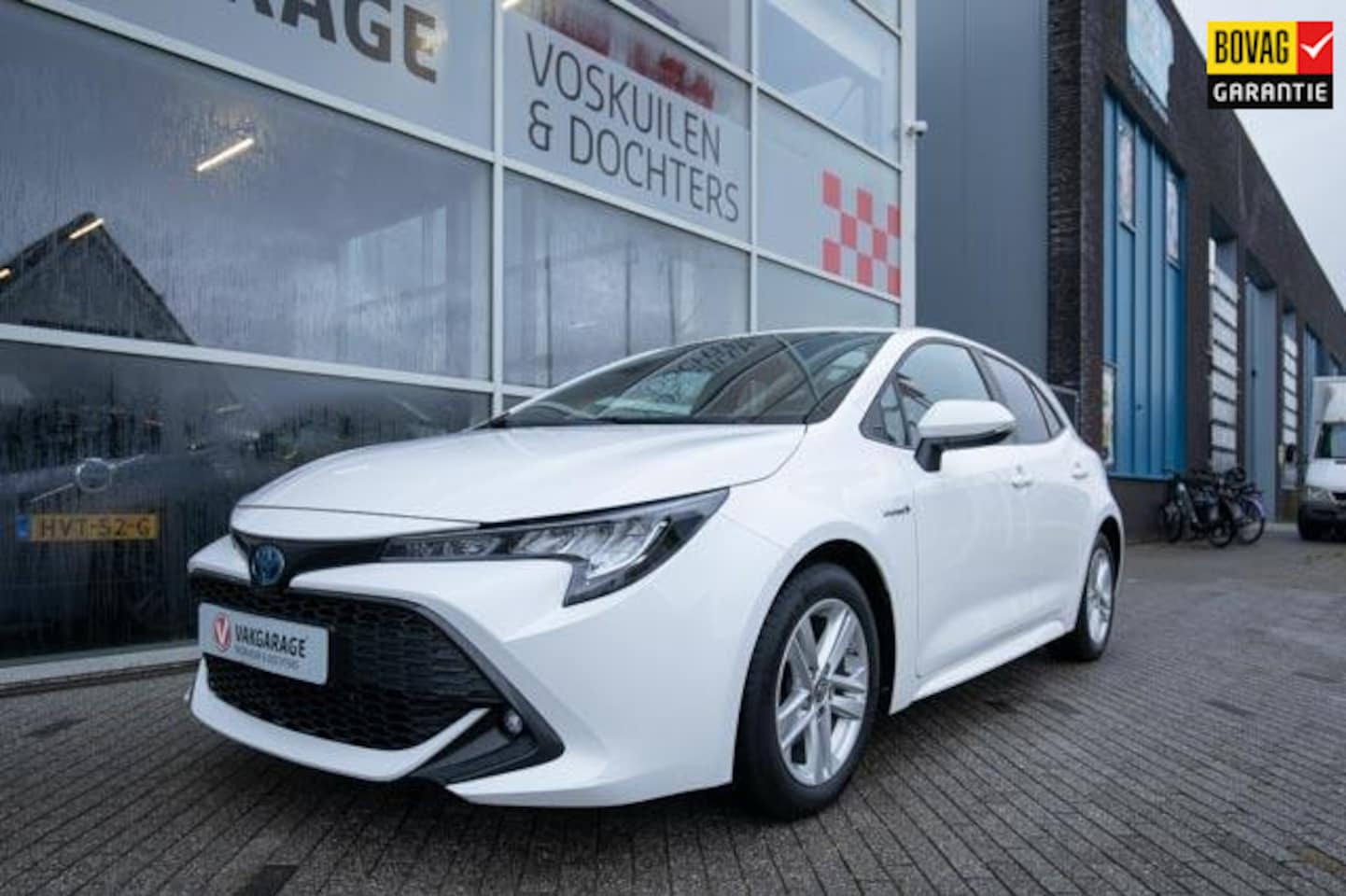 Toyota Corolla - 1.8 Hybrid Dynamic | Stoelverwarming | Carplay - AutoWereld.nl