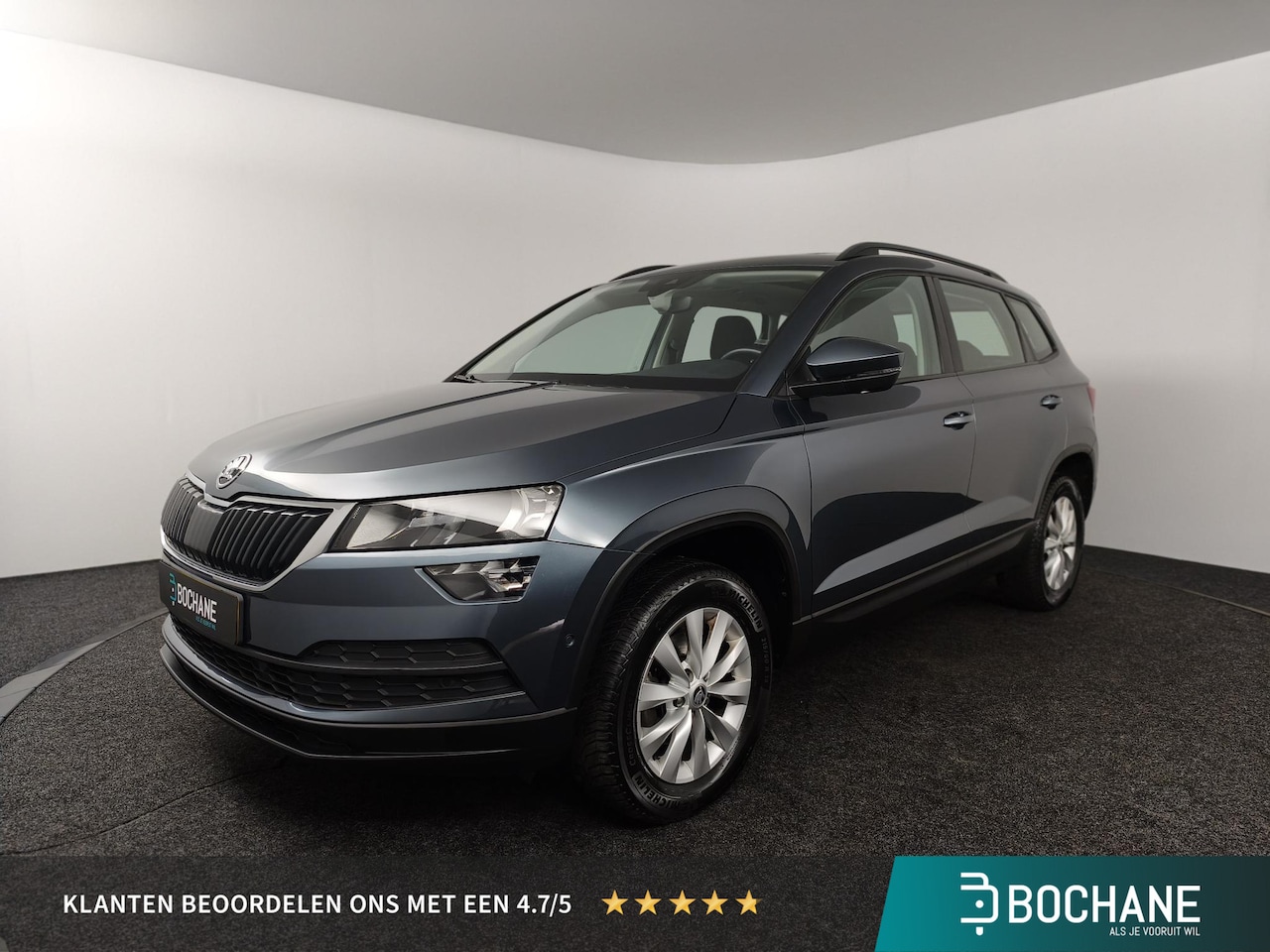 Skoda Karoq - 1.0 TSI Business Edition PANORAMADAK | WEGKLAPBARE TREKHAAK | PARKEERSENSOREN VOOR-/ACHTER - AutoWereld.nl