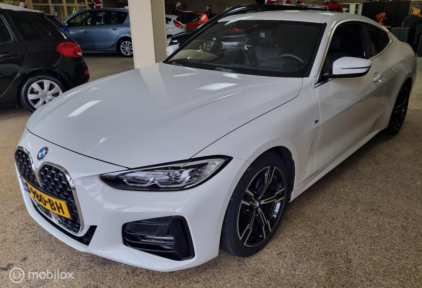 BMW 4-serie Coupé - 420i High Executive M-Sport - AutoWereld.nl