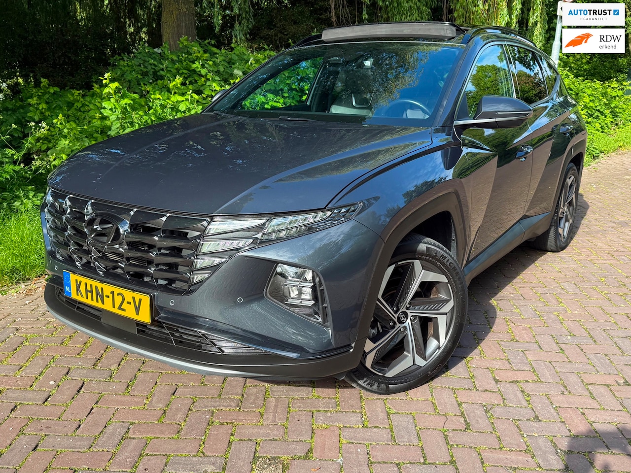 Hyundai Tucson - 1.6 T-GDI PHEV Premium Sky 4WD 265 PK 1Eig. b.j. 4-2024 72000km leer,Panodak ,19"lm ,trekh - AutoWereld.nl