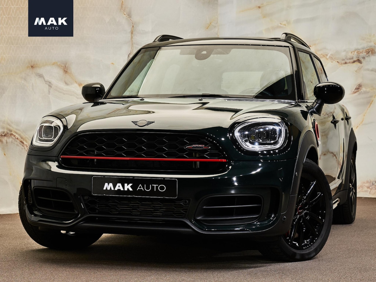 MINI Countryman - 2.0 JCW ALL4 John Cooper Works 2.0 JCW ALL4 John Cooper Works, pano, HUD, LED-kopl., memory, 18", keyless, sport.stl., pr - AutoWereld.nl