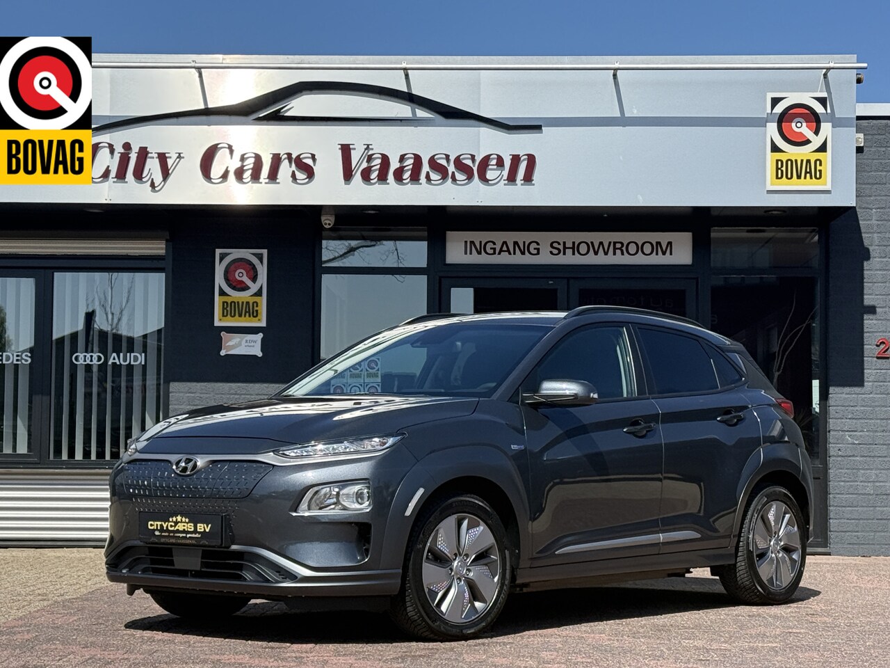 Hyundai Kona Electric - EV Comfort 39 kWh 136 pk SOH 94.5% apple carplay camera climate ctr cruise ctr lmv 17 inch - AutoWereld.nl