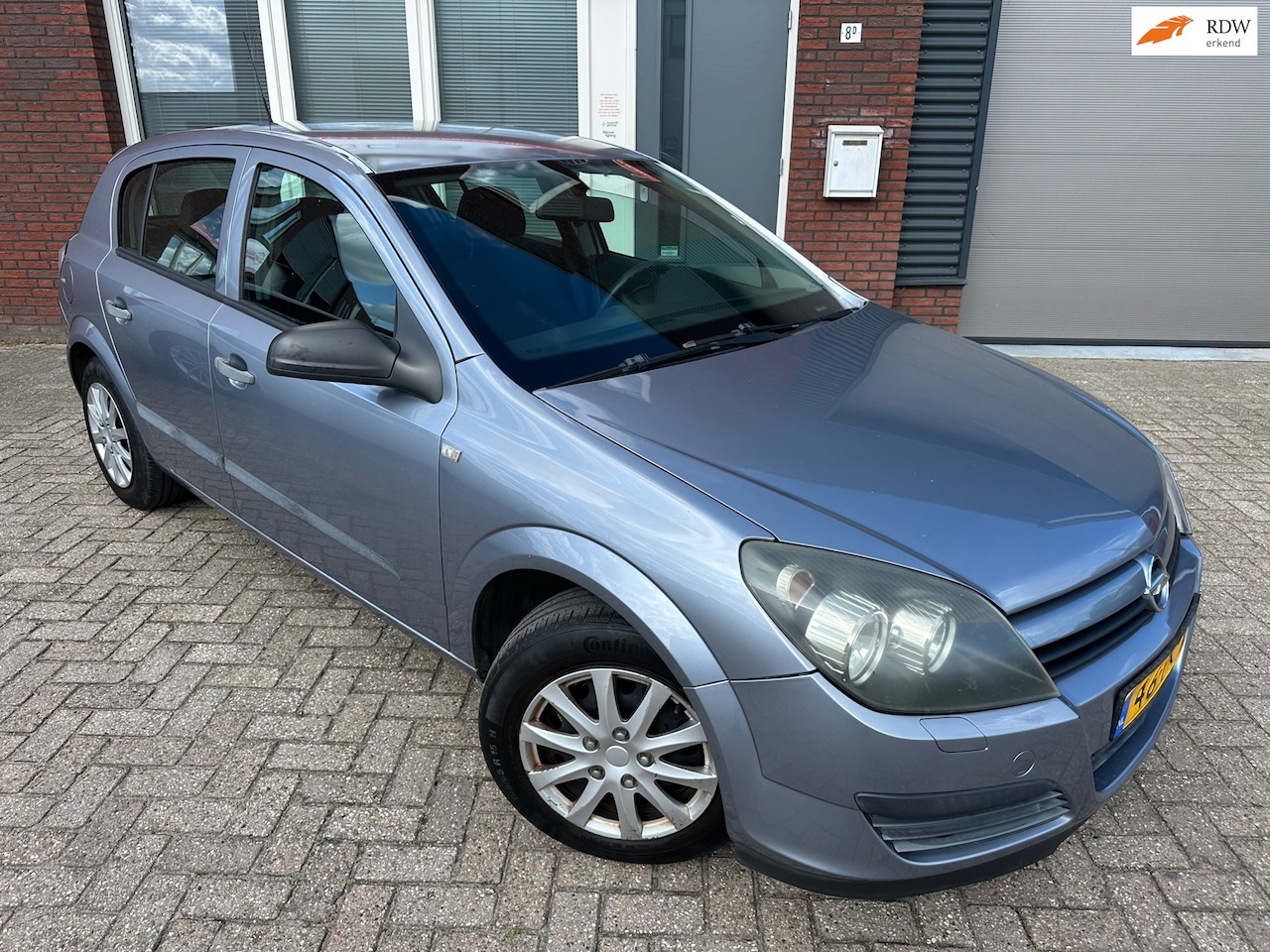 Opel Astra - 1.4 Essentia / Airco / Cruise / NAP - AutoWereld.nl