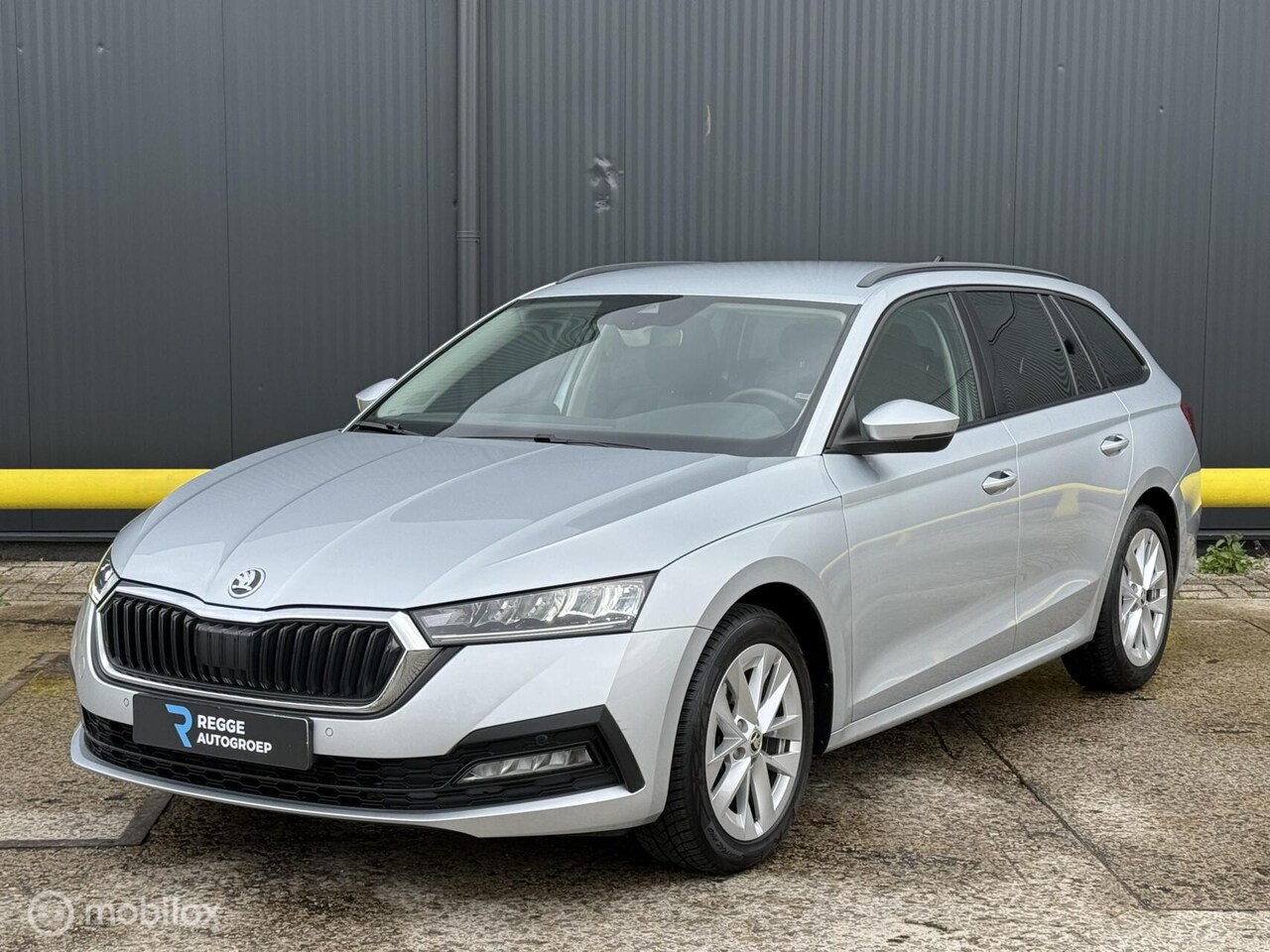 Skoda Octavia Combi - 1.0 e-TSI Ambition TREKHAAK | AUTOMAAT - AutoWereld.nl