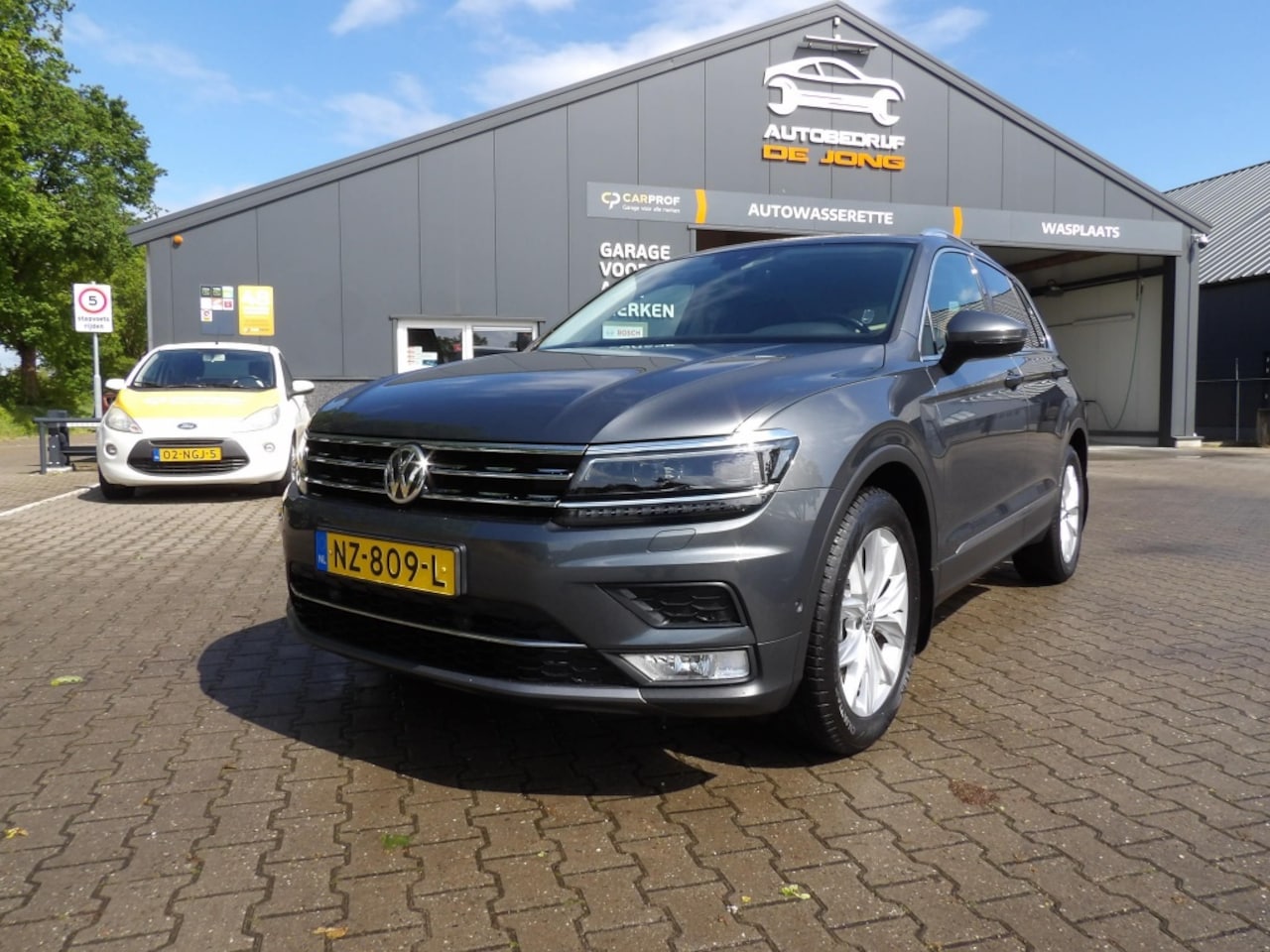 Volkswagen Tiguan - 1.4 TSI ACT Highl. - AutoWereld.nl