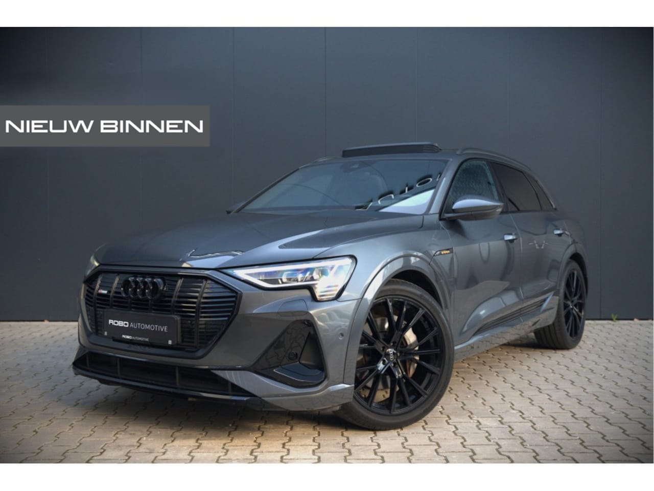 Audi e-tron - e-tron 50 quattro Launch edition Black 71 kWh | Panoramadak | Stoelverwarming | Adaptive C - AutoWereld.nl