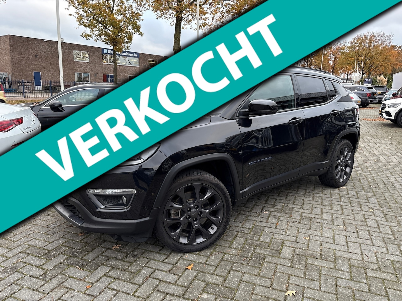 Jeep Compass - 4xe 240 Plug-in Hybrid Electric S/ trekhaak / leder / navi / camera / boeken / Alpine audi - AutoWereld.nl